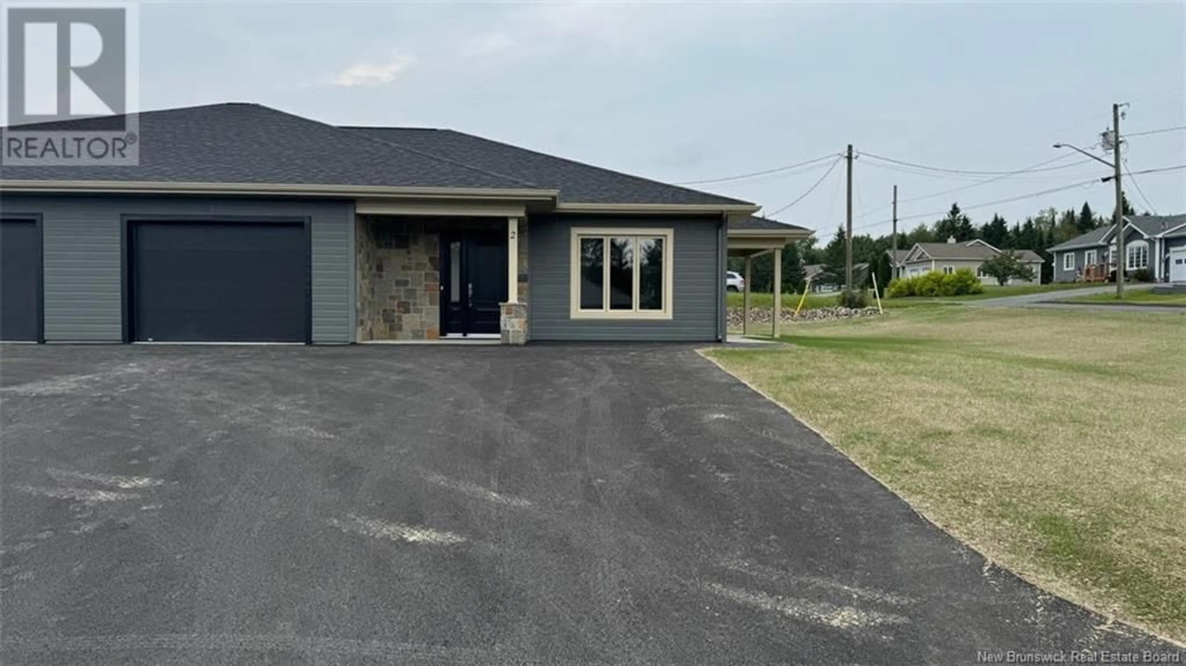 Frontside or backside of a home, the street view for 2 Honore Roy Street, Saint-Léonard New Brunswick E7E2C4