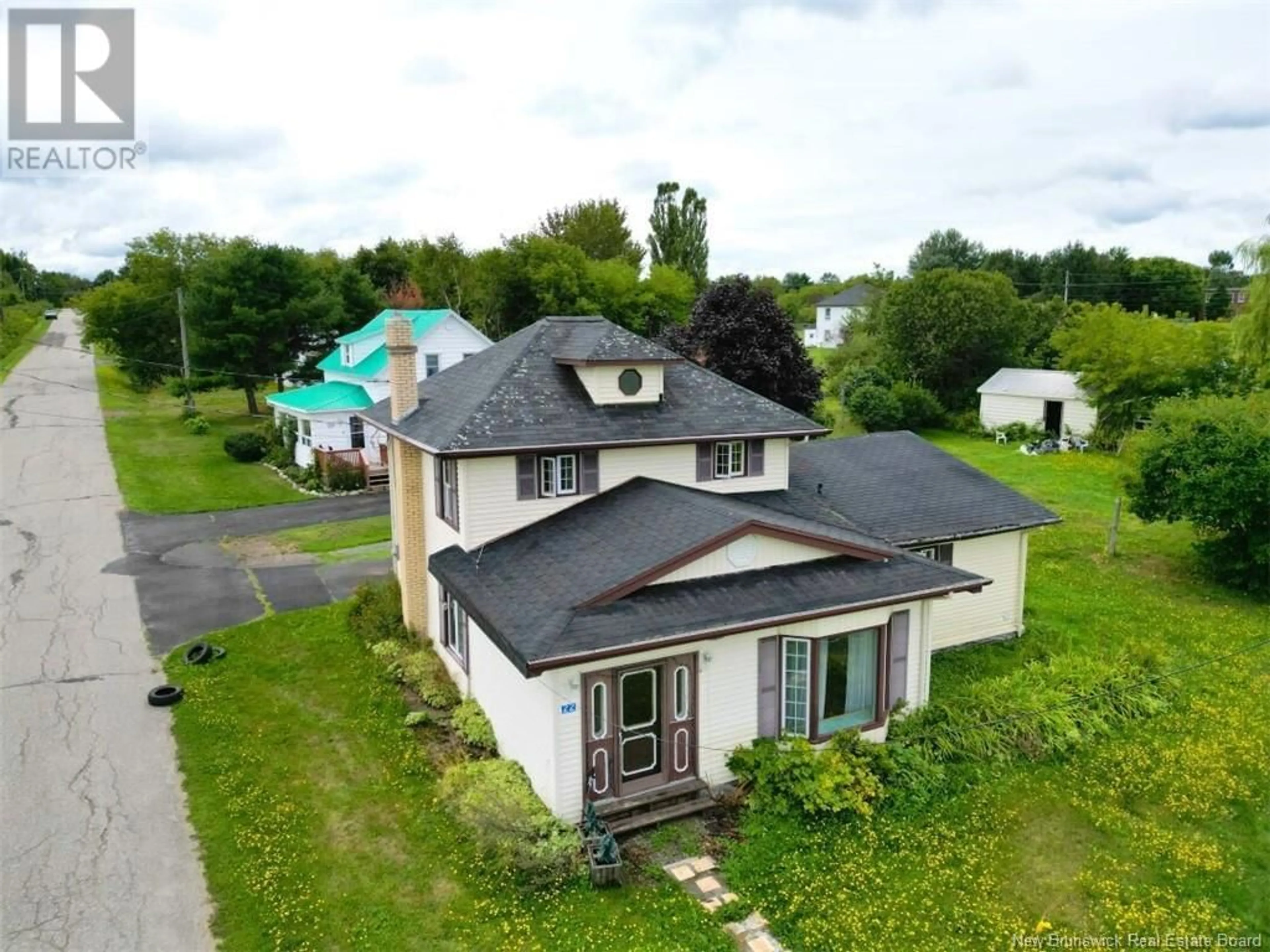 Frontside or backside of a home, cottage for 22 McAllister, Belledune New Brunswick E8G2R6