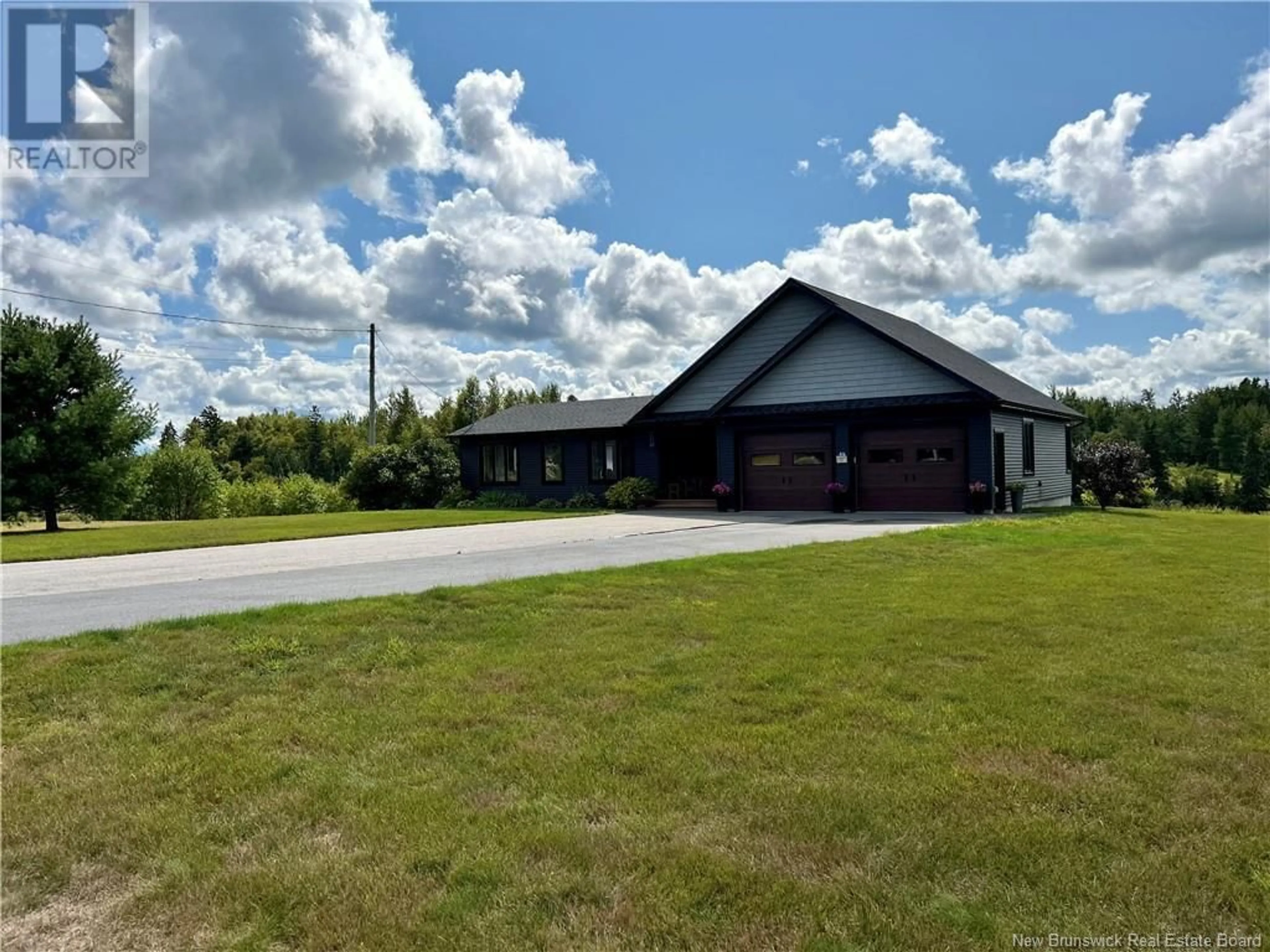 Frontside or backside of a home, the front or back of building for 46 Riviere du Portage Road, Baie-Sainte-Anne New Brunswick E9A1G4