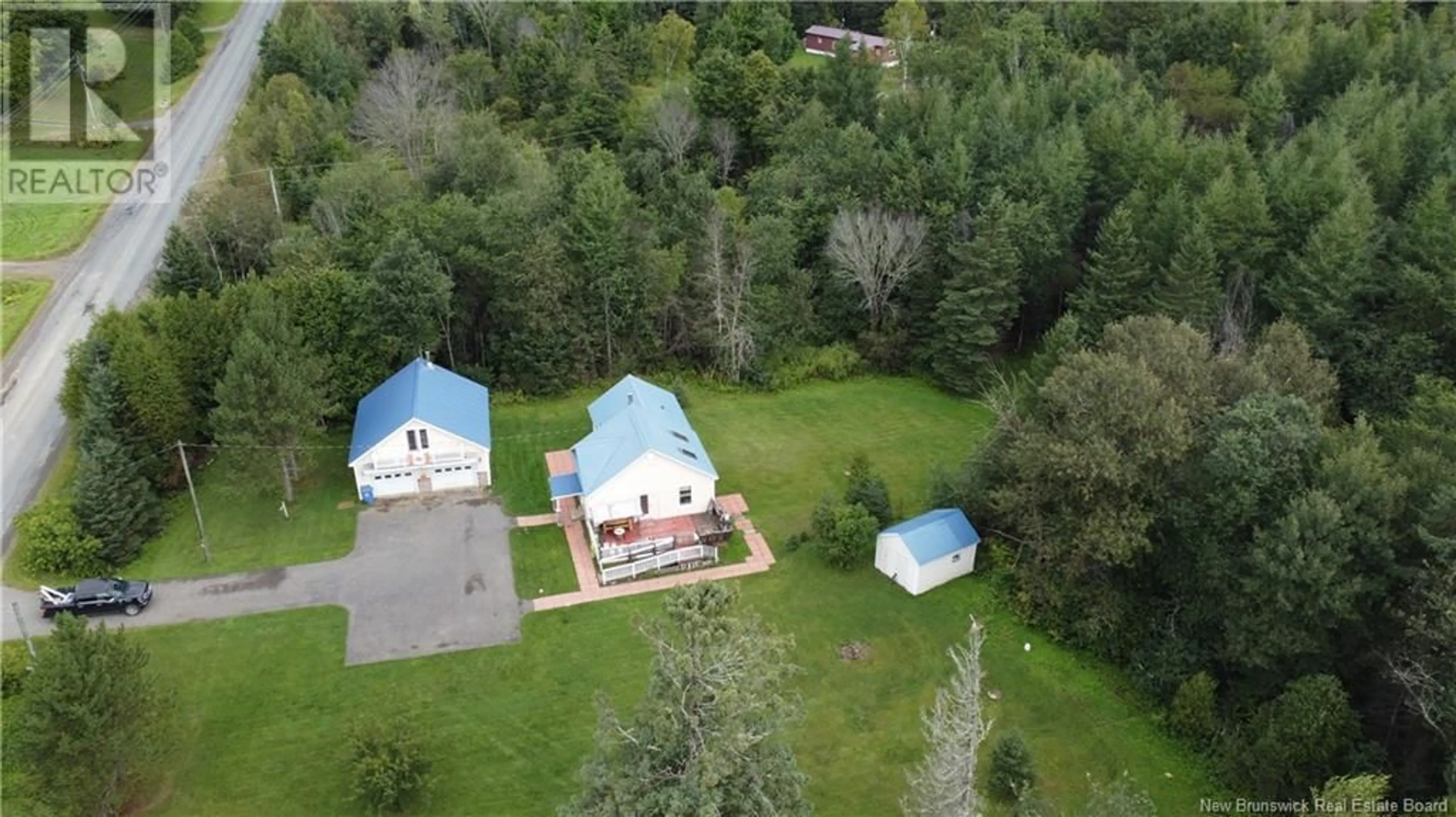 A pic from outside/outdoor area/front of a property/back of a property/a pic from drone, unknown for 2300 ROUTE 560 ROUTE, Lakeville New Brunswick E7K1T4
