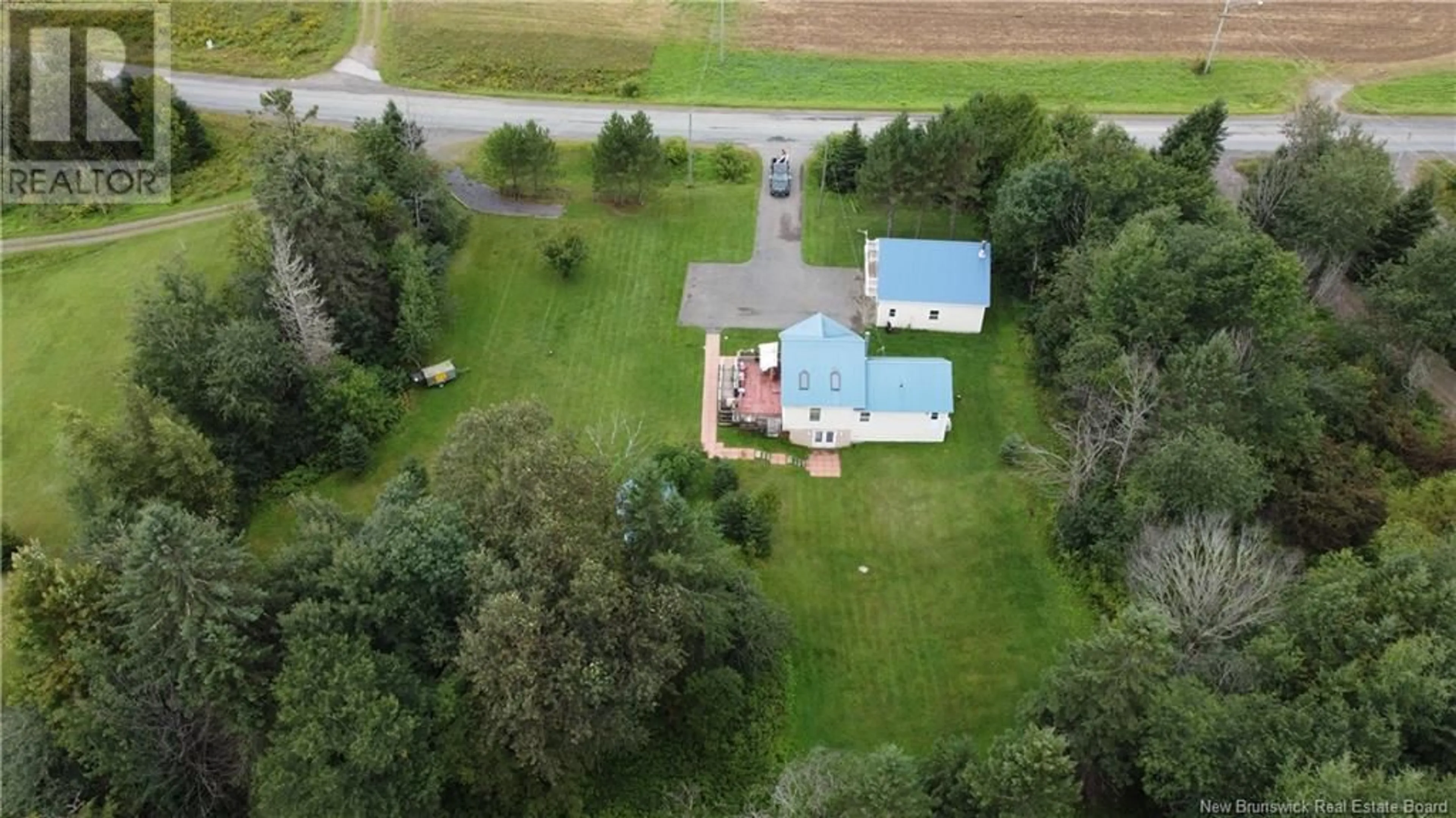 A pic from outside/outdoor area/front of a property/back of a property/a pic from drone, unknown for 2300 ROUTE 560 ROUTE, Lakeville New Brunswick E7K1T4