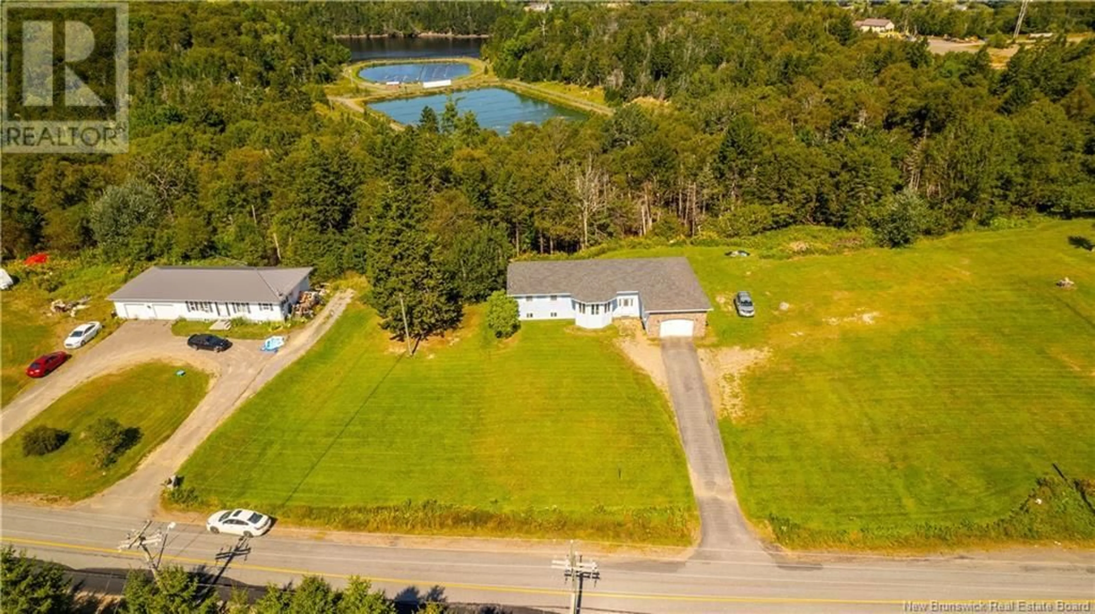 A pic from exterior of the house or condo, the fenced backyard for 168 Letete Road, St George New Brunswick E5C3H6