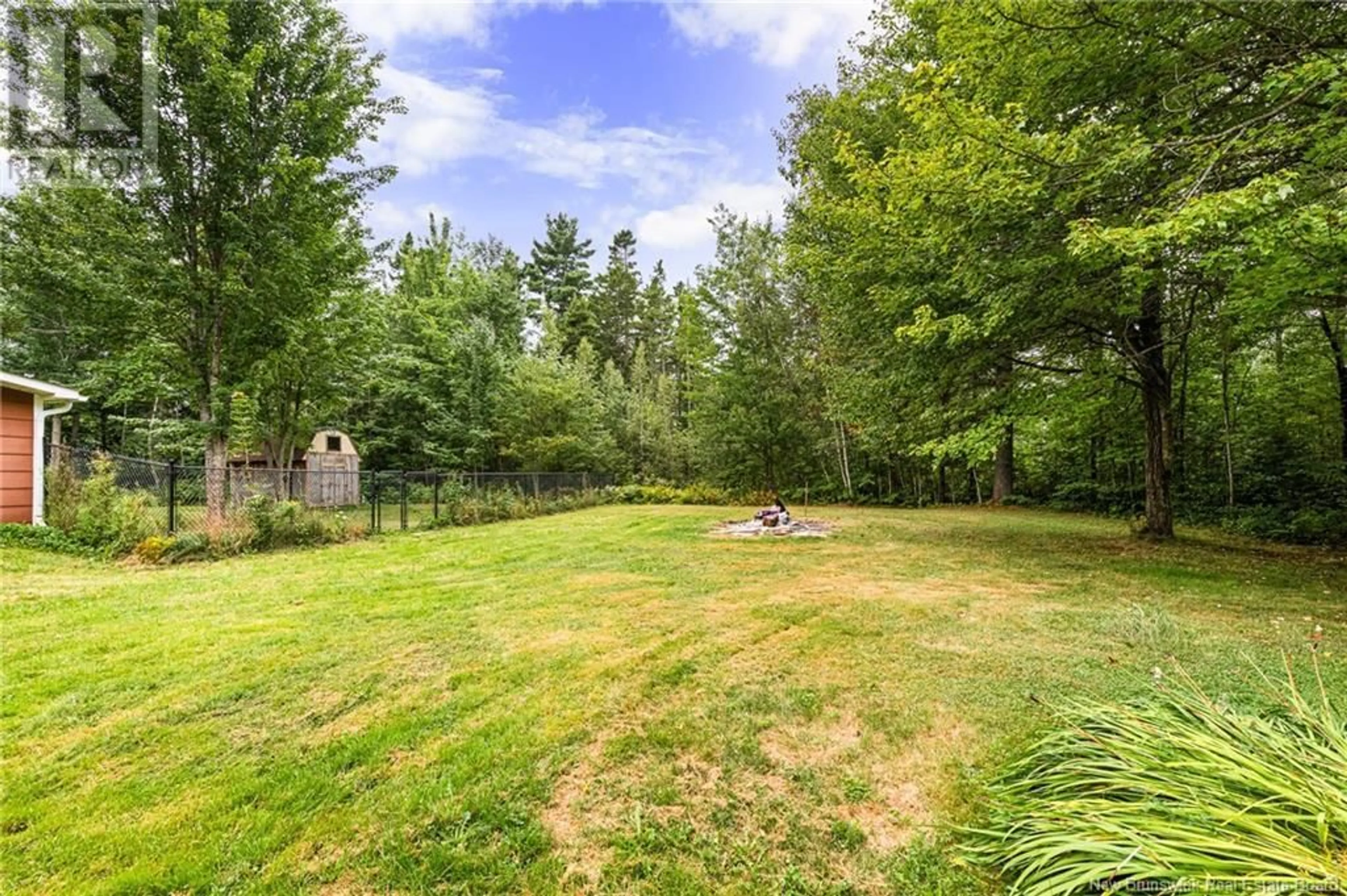 Patio, the fenced backyard for 46 Brown Road, Berry Mills New Brunswick E1G3Z4