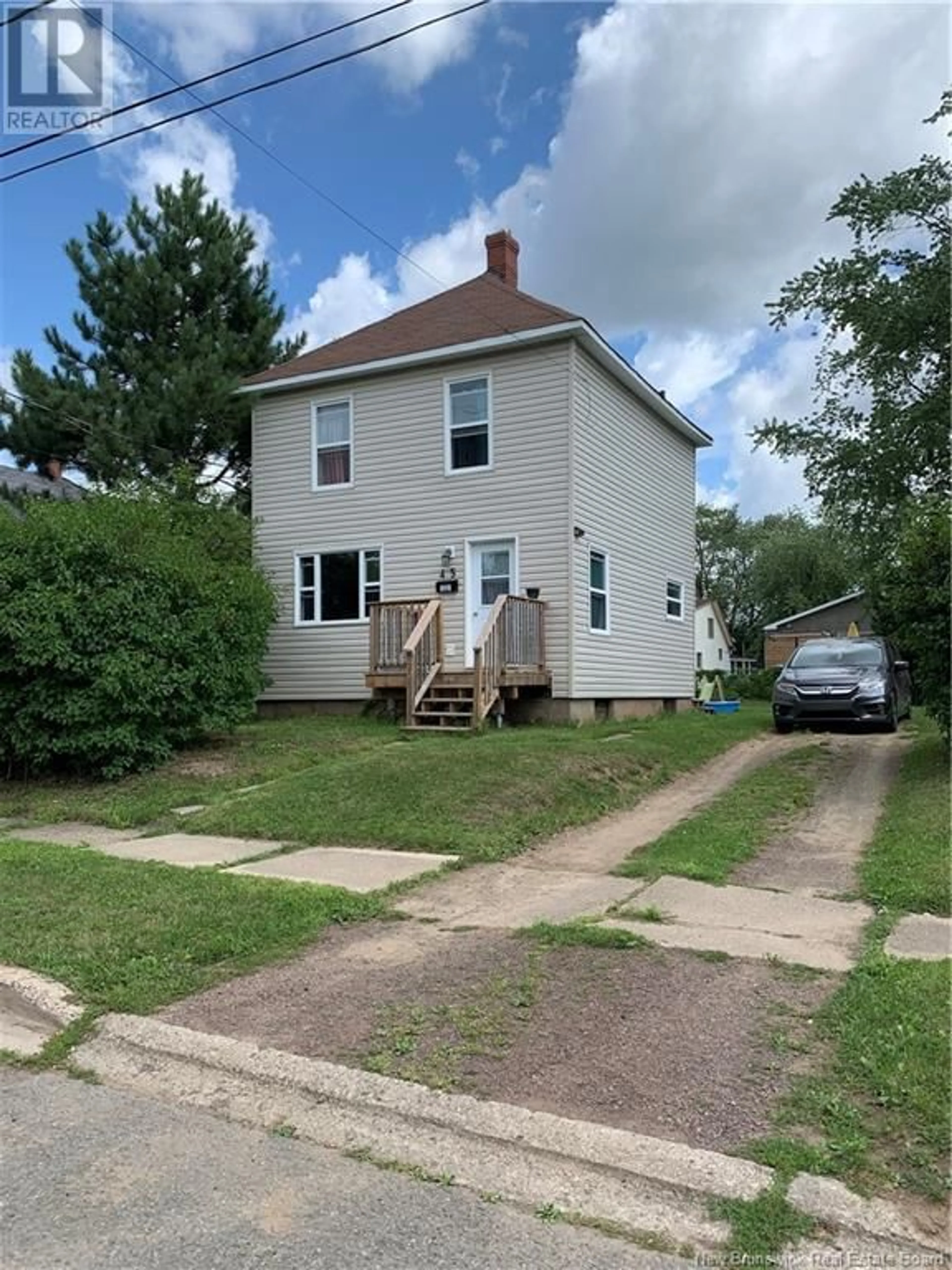 Frontside or backside of a home, the front or back of building for 45 Seventh Street, Moncton New Brunswick E1E3G3