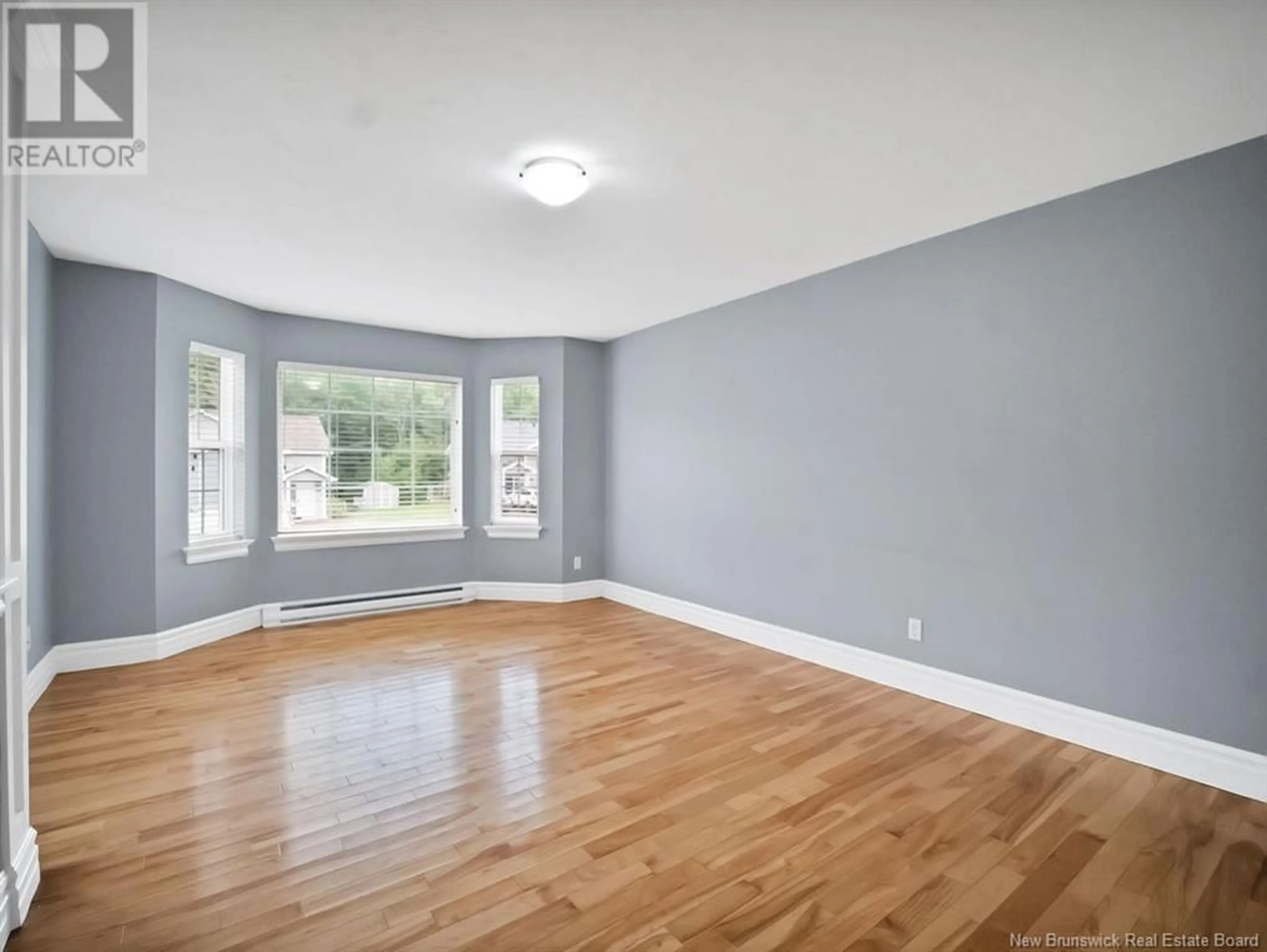 A pic of a room, wood floors for 147 Belle Foret, Dieppe New Brunswick E1A9E6