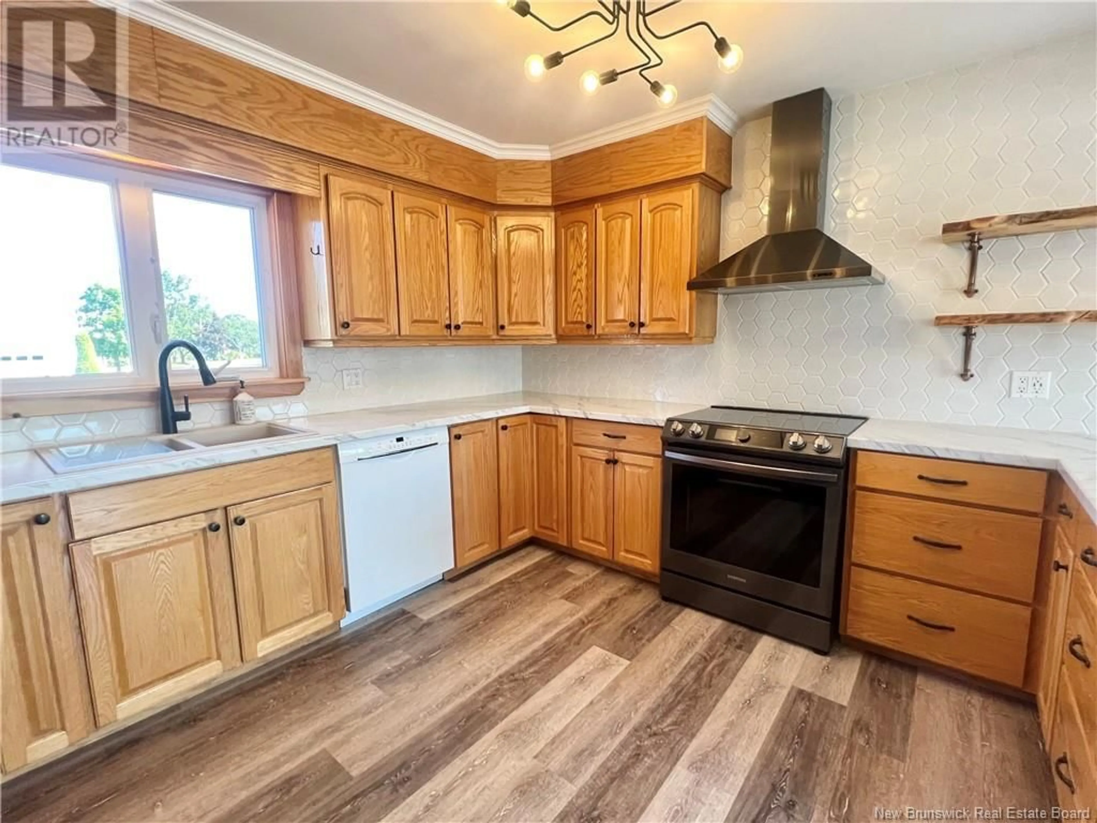 Open concept kitchen for 1079 Winton, Bathurst New Brunswick E2A4G6