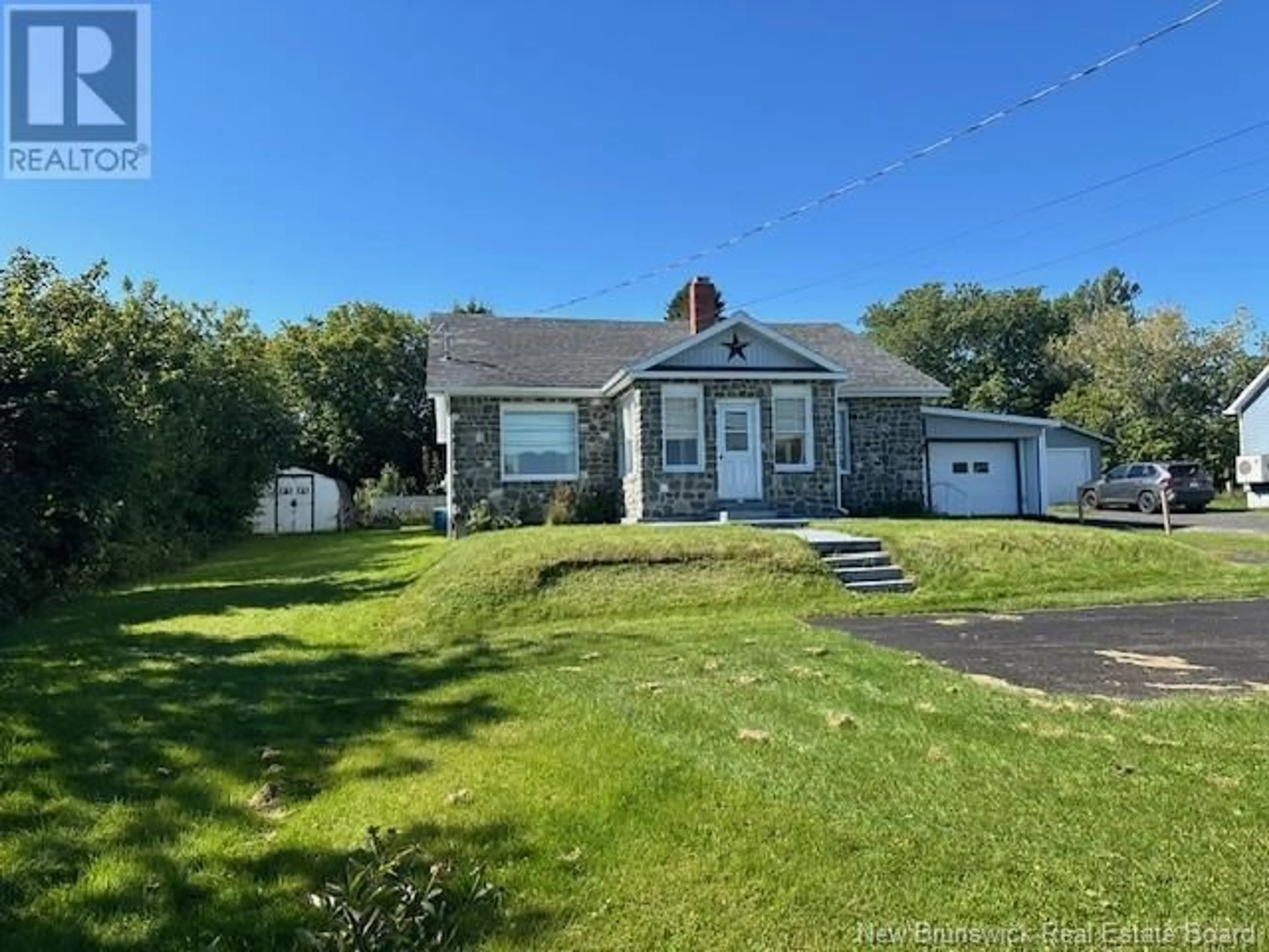 A pic from outside/outdoor area/front of a property/back of a property/a pic from drone, street for 236 CHALEUR STREET, Charlo New Brunswick E8E2E9