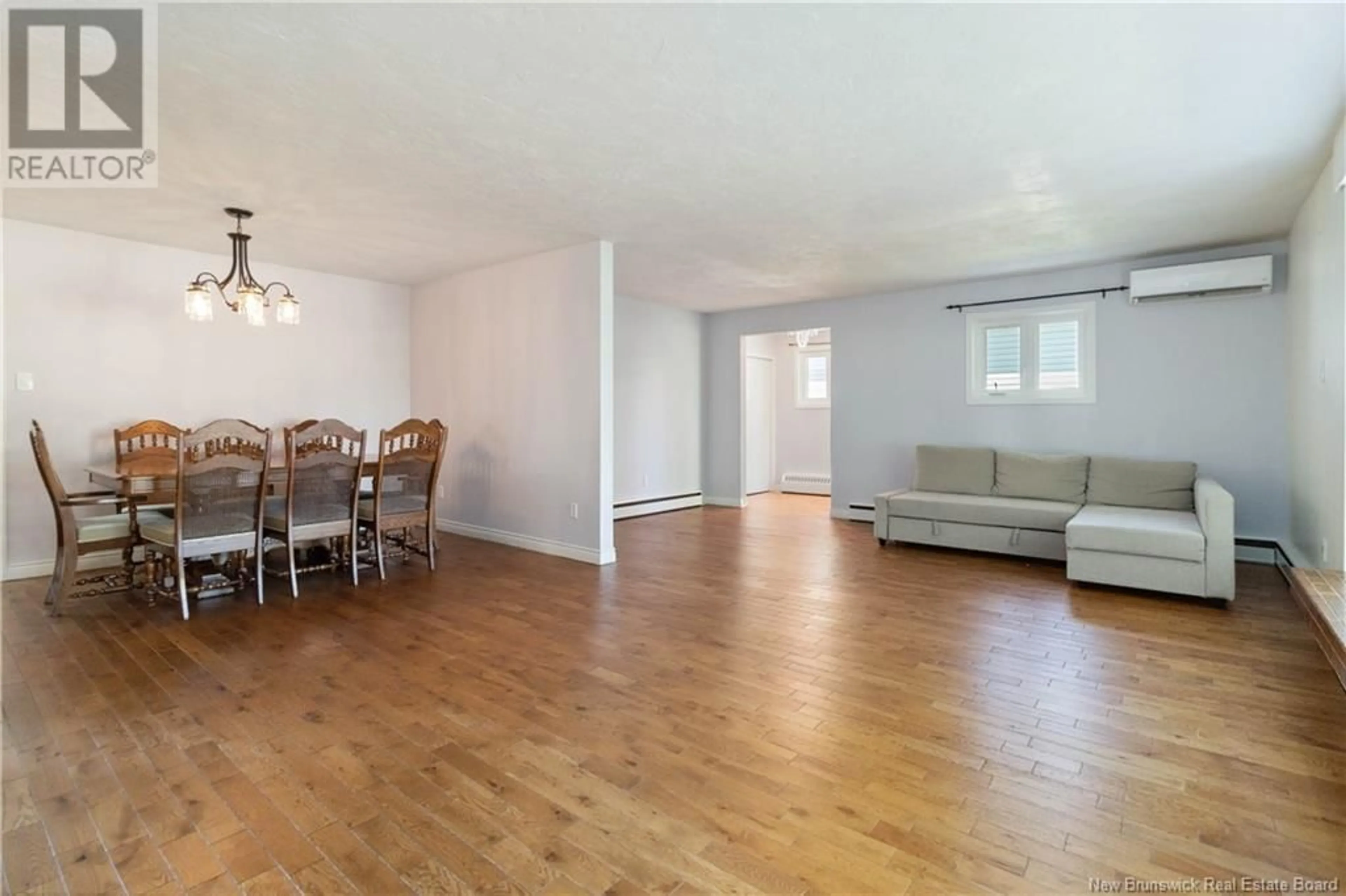 A pic of a room, wood floors for 20 Vista Drive, Moncton New Brunswick E1A4L5