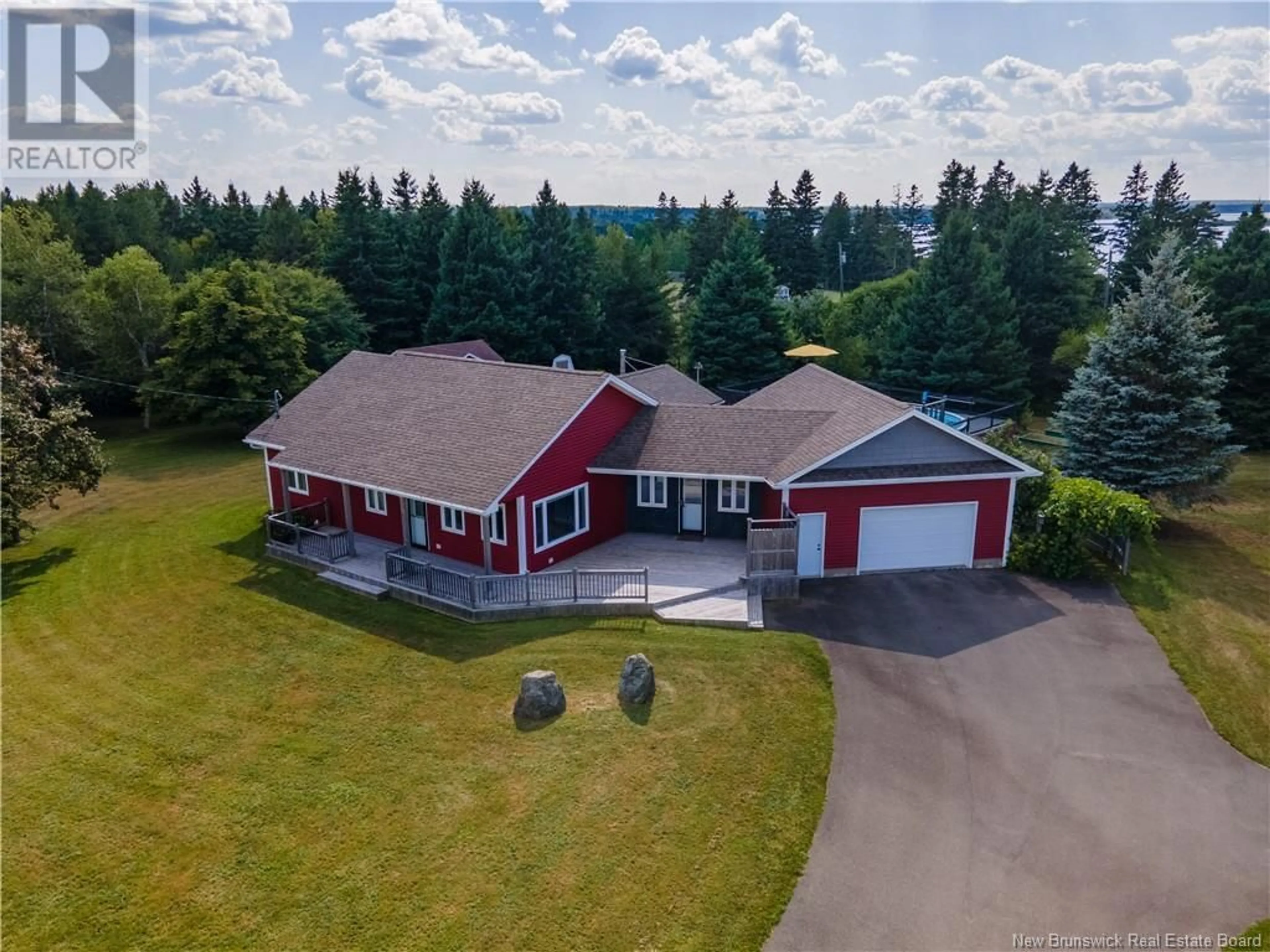 Frontside or backside of a home, the front or back of building for 100 Dupuis, Cocagne New Brunswick E4R2P3