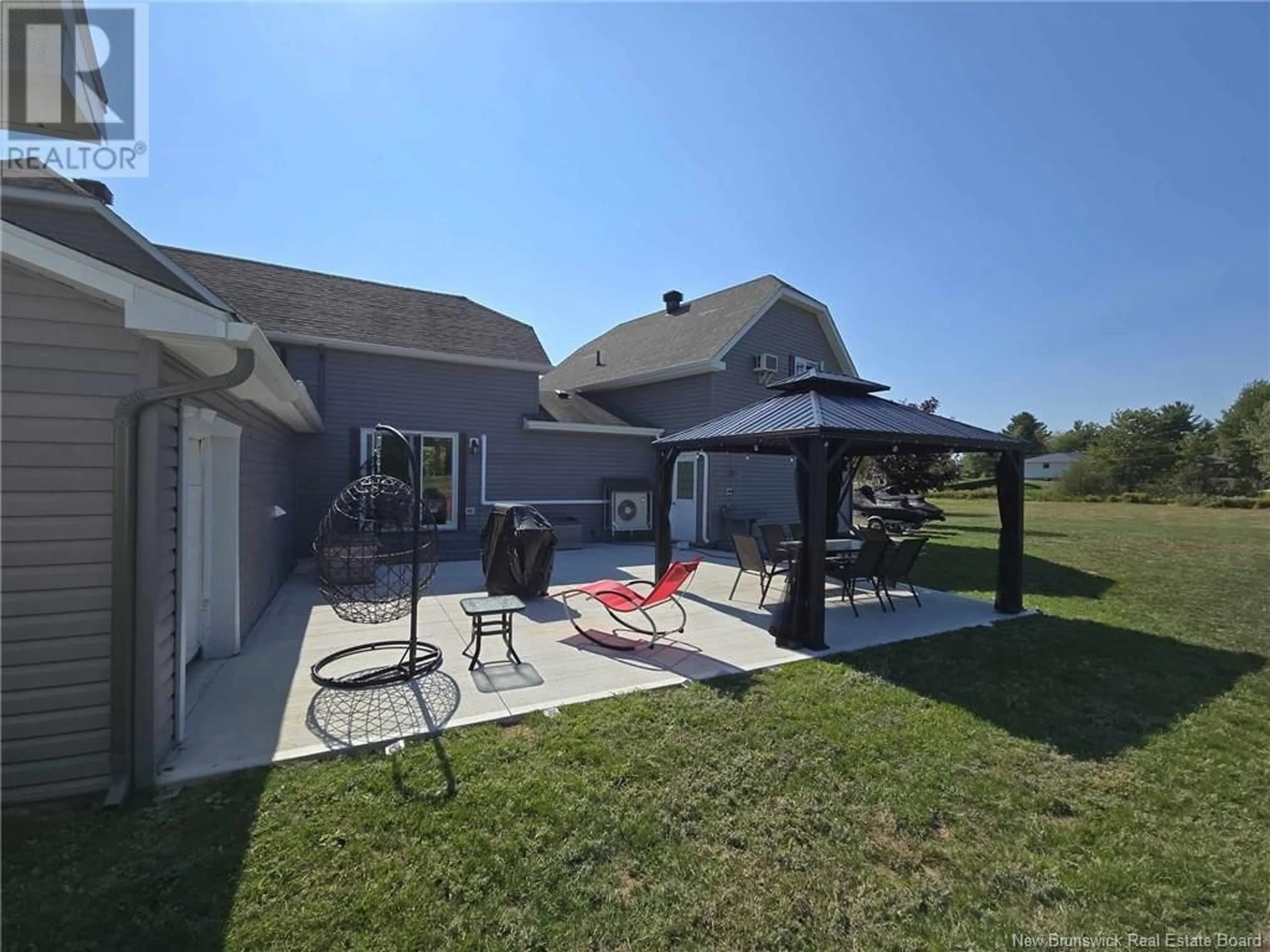 Patio, the fenced backyard for 158 Fairisle, Neguac New Brunswick E9G1E6