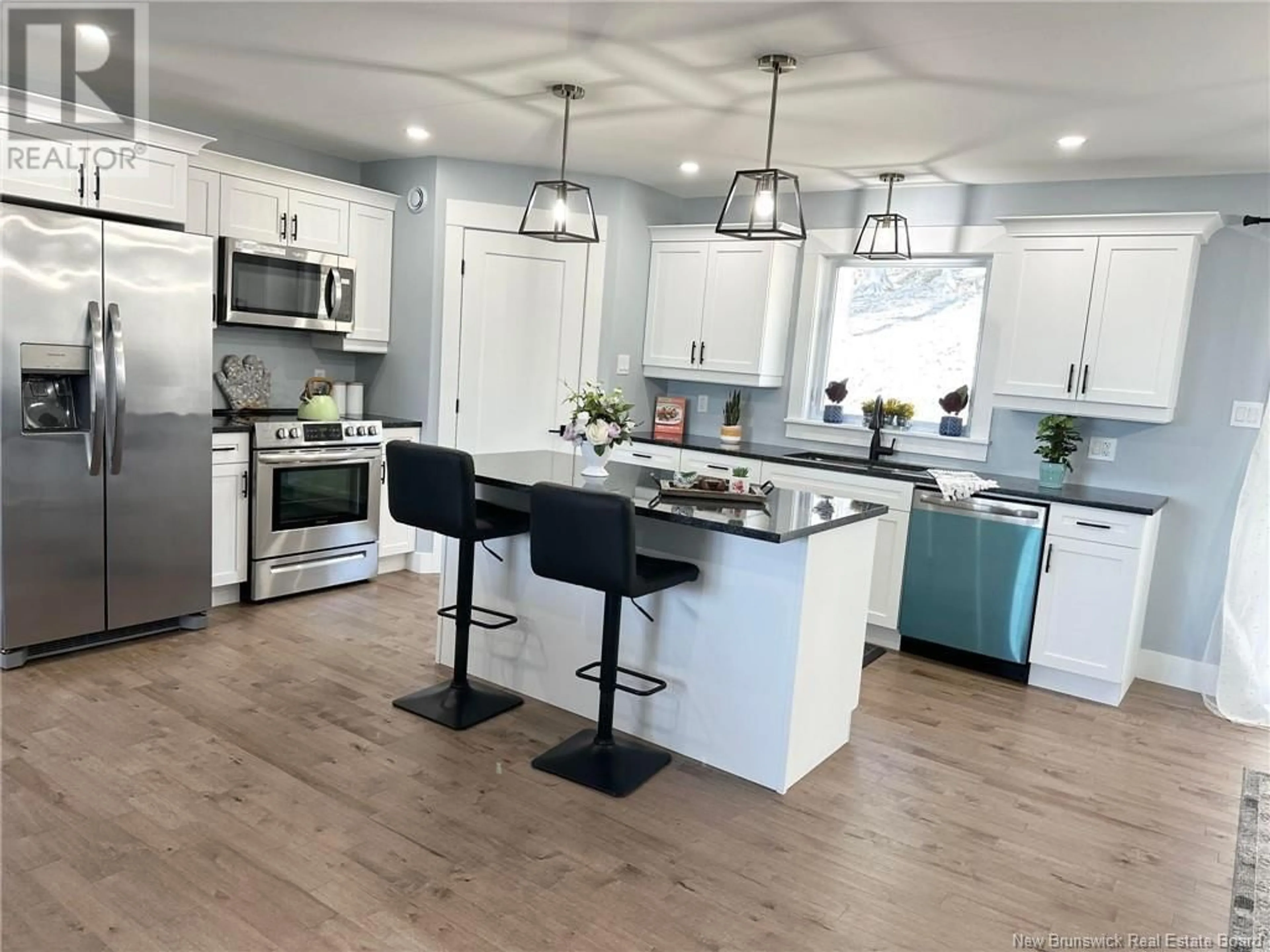 Open concept kitchen for 12 Blenheim Drive, Quispamsis New Brunswick E2G0L9