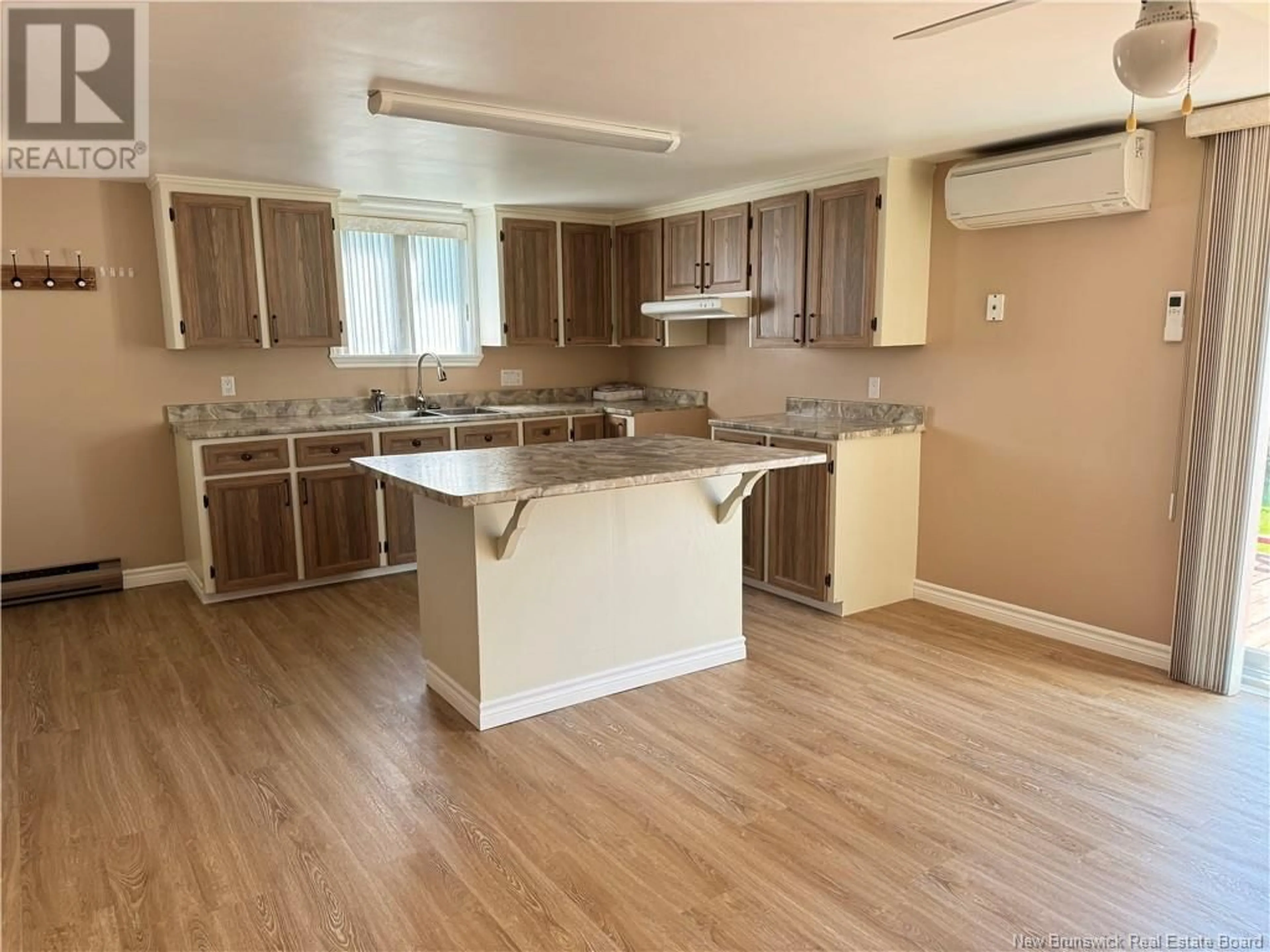 Open concept kitchen for 83 Court Street, Grand-Sault/Grand Falls New Brunswick E3Z2P6