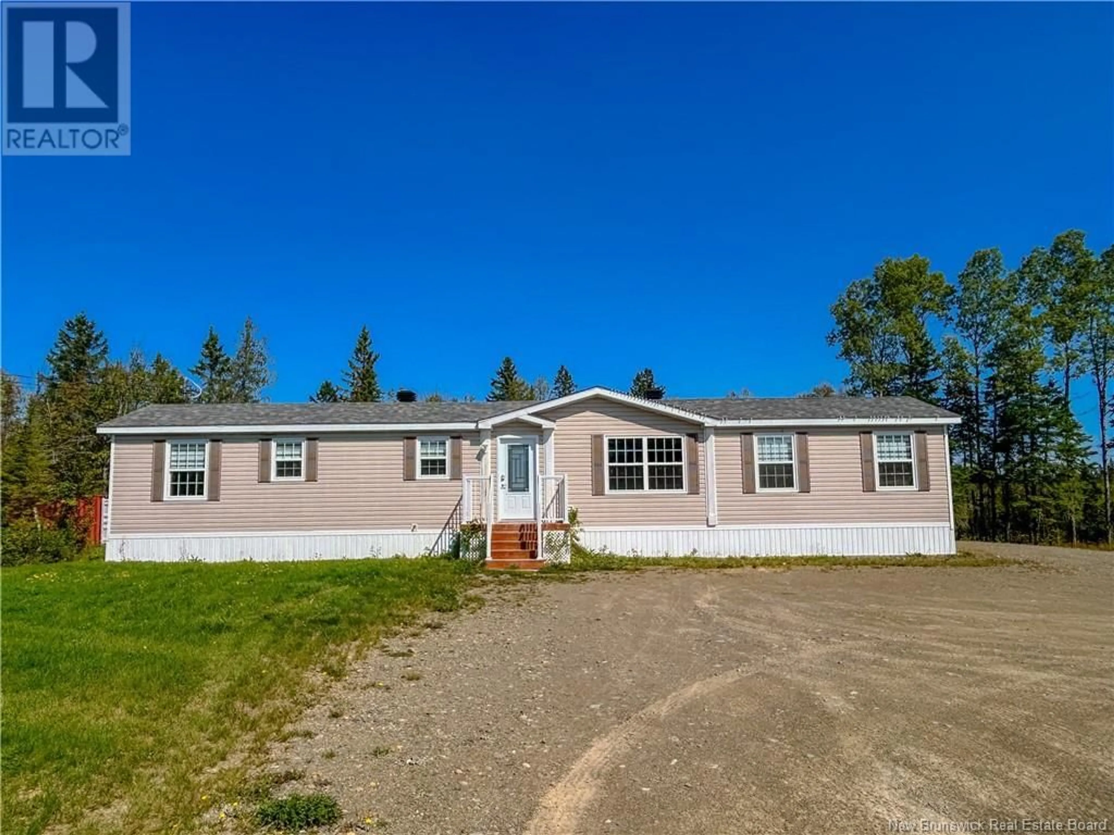 Frontside or backside of a home for 7 Des Pionniers Avenue, Balmoral New Brunswick E8E2N4