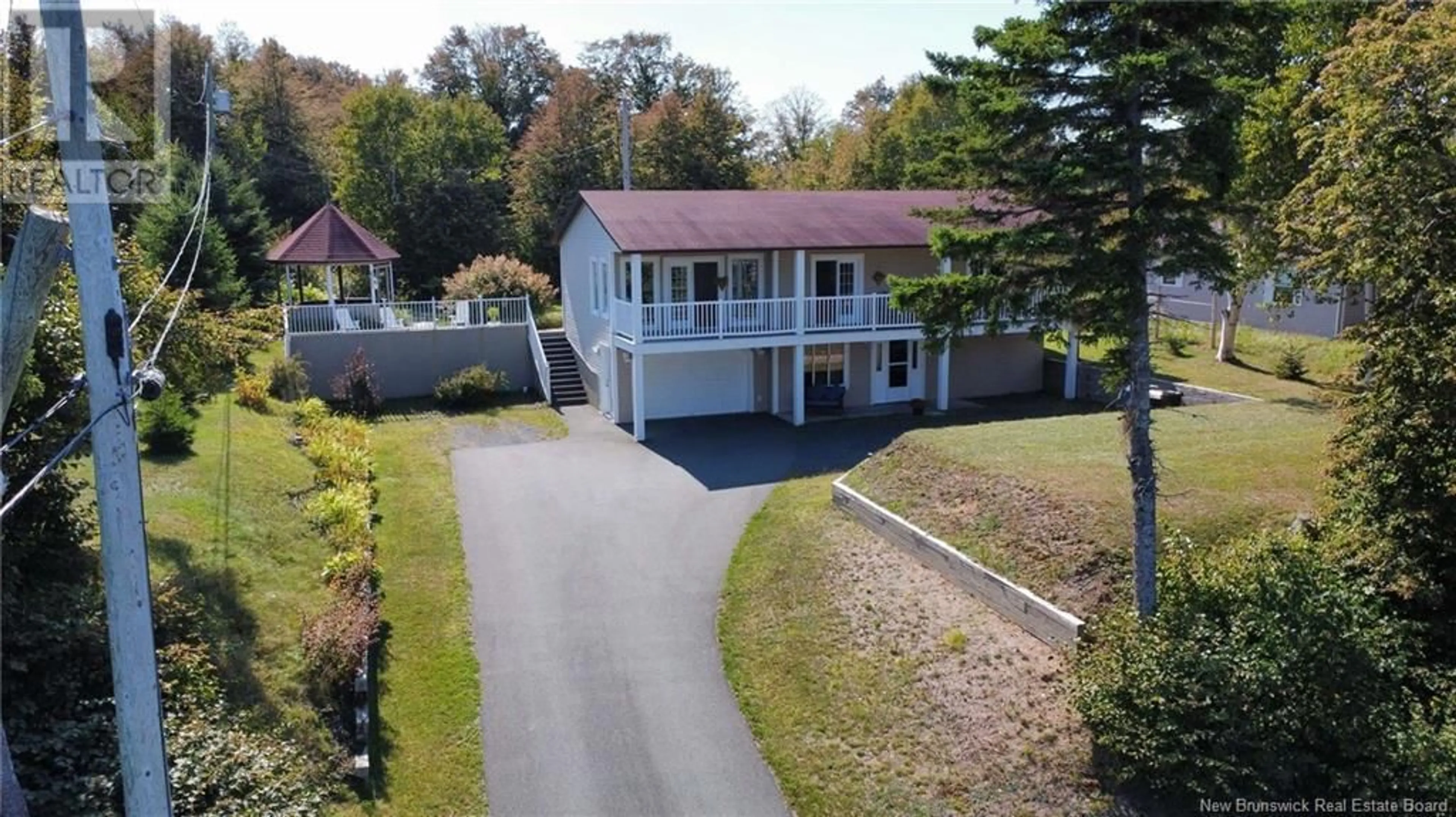 Frontside or backside of a home, cottage for 1975 Queen Elizabeth Drive, Bathurst New Brunswick E2A4Y4