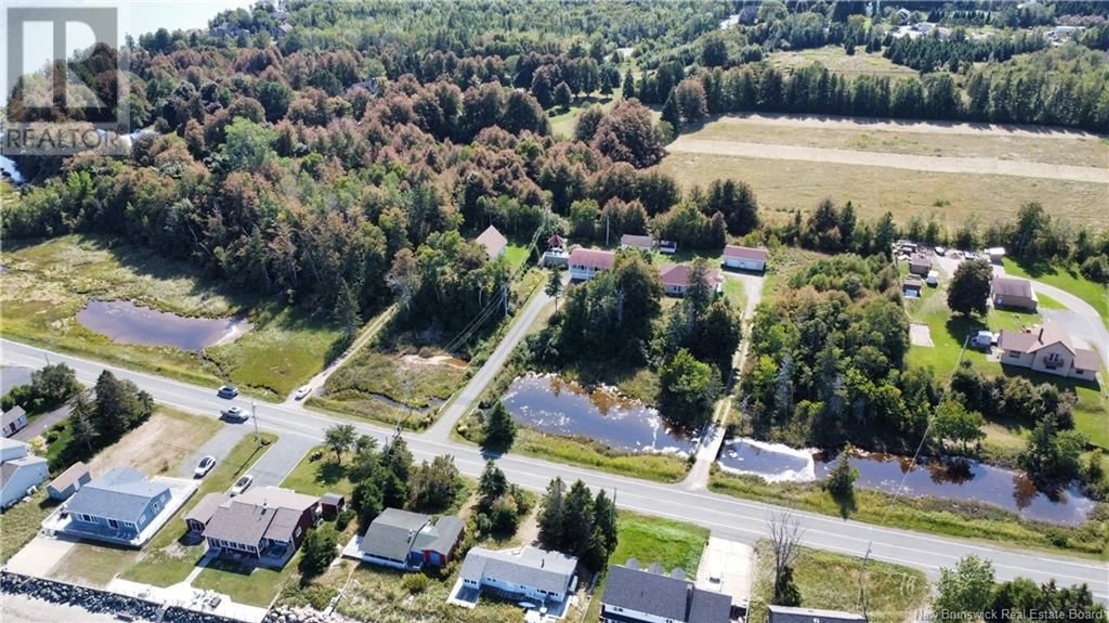 A pic from exterior of the house or condo, the street view for 1975 Queen Elizabeth Drive, Bathurst New Brunswick E2A4Y4