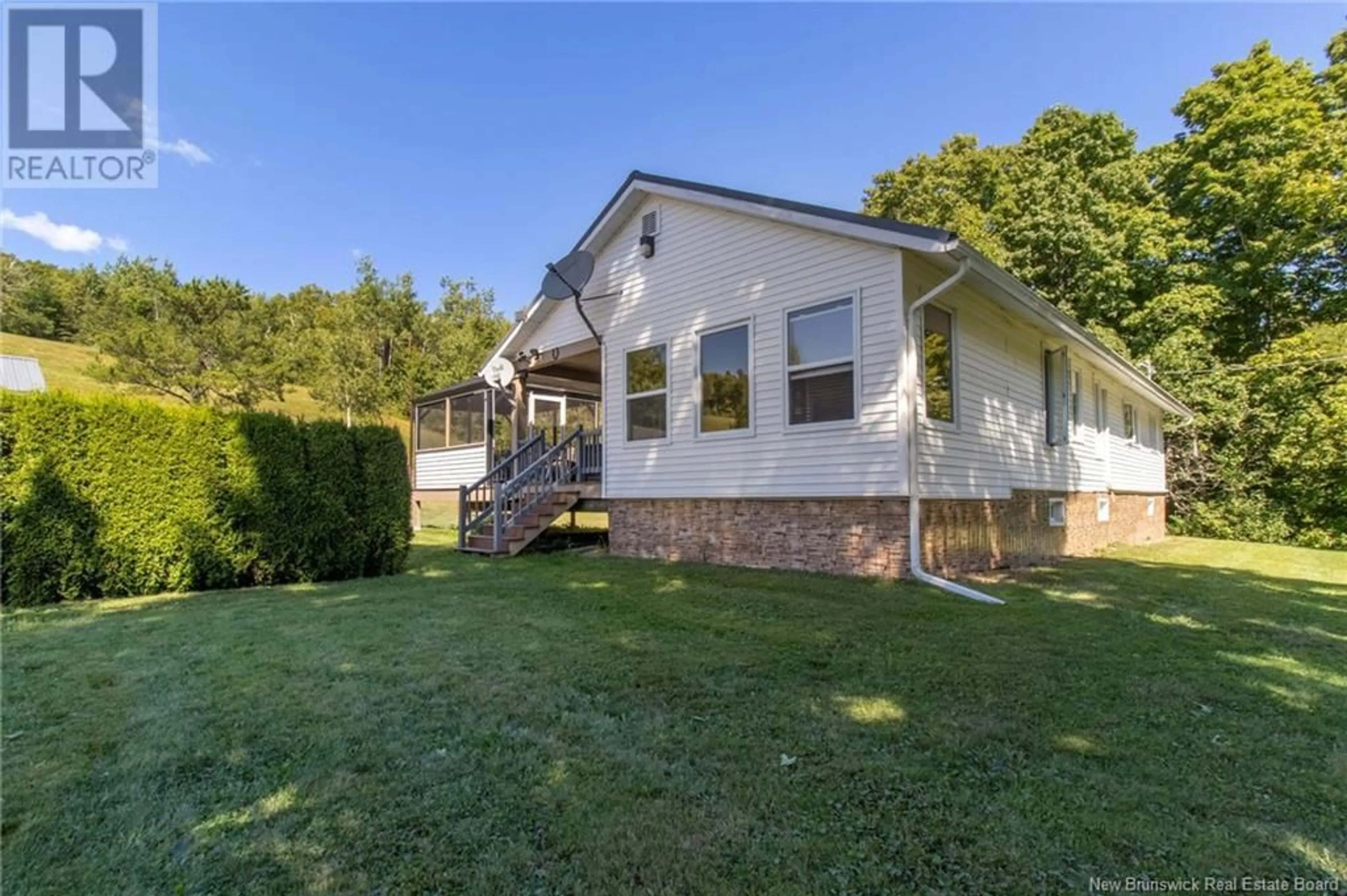 Frontside or backside of a home, the fenced backyard for 2930 Route 910, Rosevale New Brunswick E1H1C8