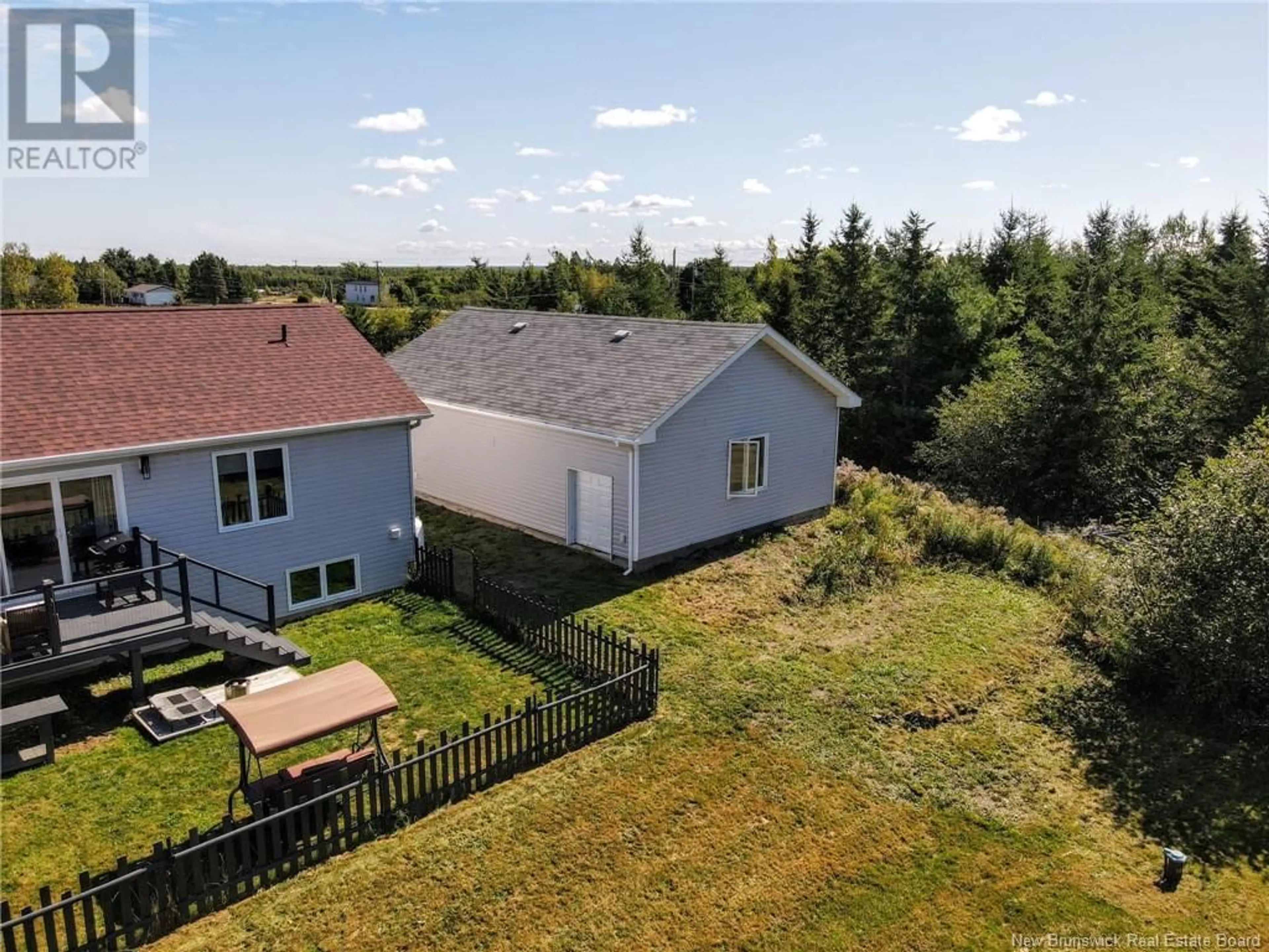 Frontside or backside of a home, the fenced backyard for 1192 Falconer Road, MacDougall Settlement New Brunswick E1H3G6