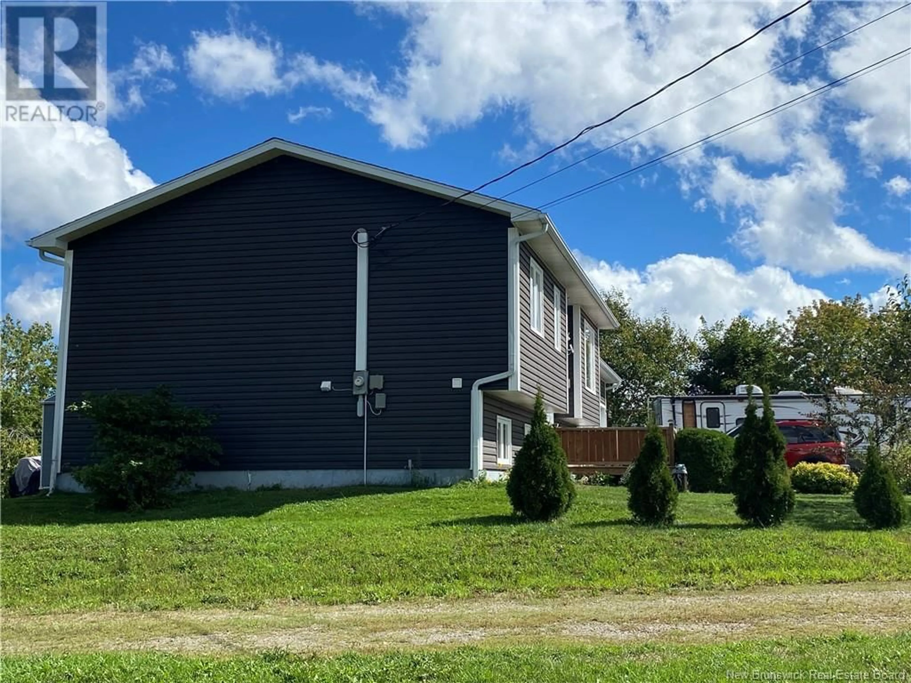 Frontside or backside of a home, the front or back of building for 125 Rue Principale, Pointe-Verte New Brunswick E8J2V8