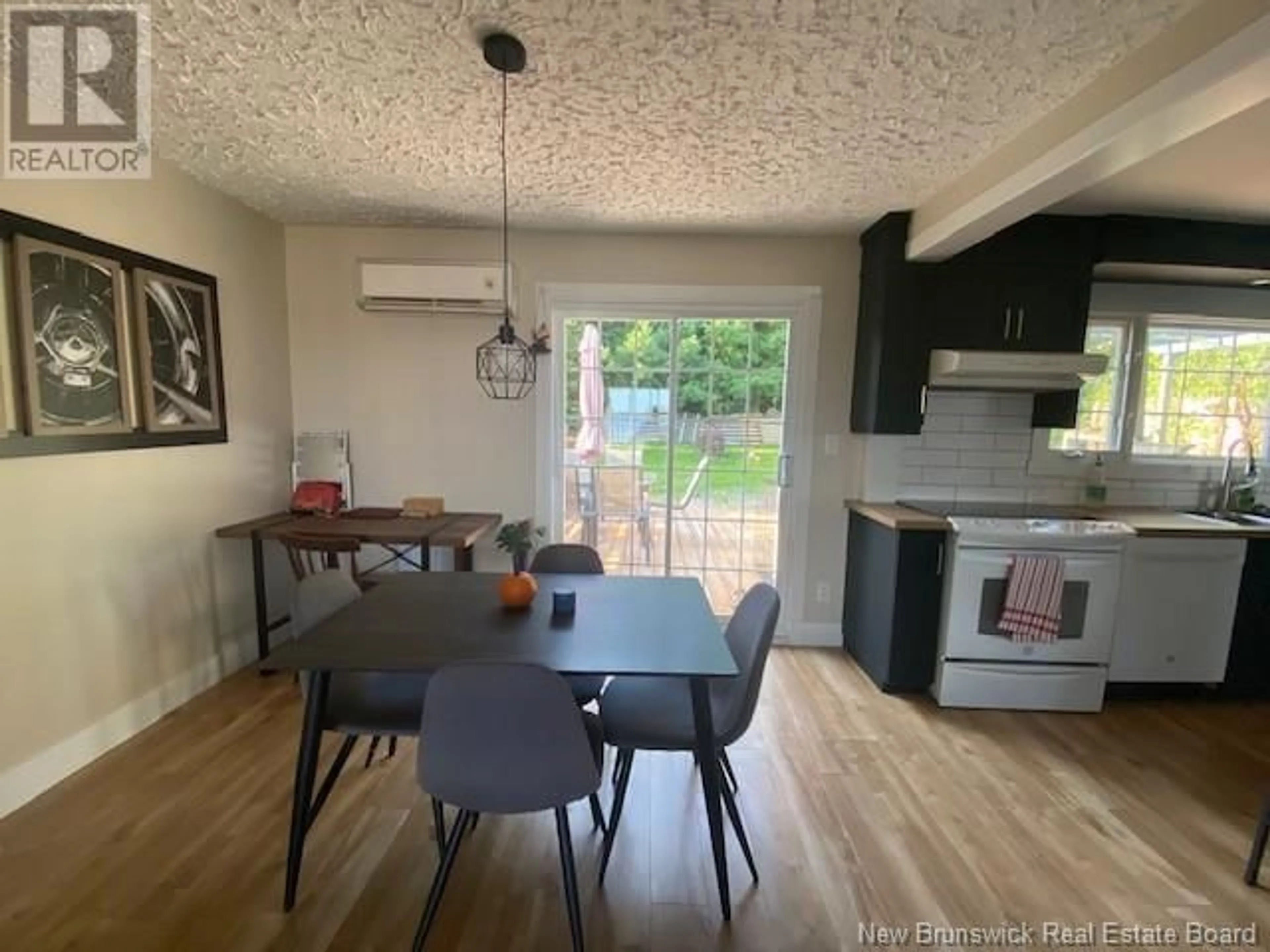 Dining room, wood floors, cottage for 544 Montgomery Street, Dalhousie New Brunswick E8C2A8