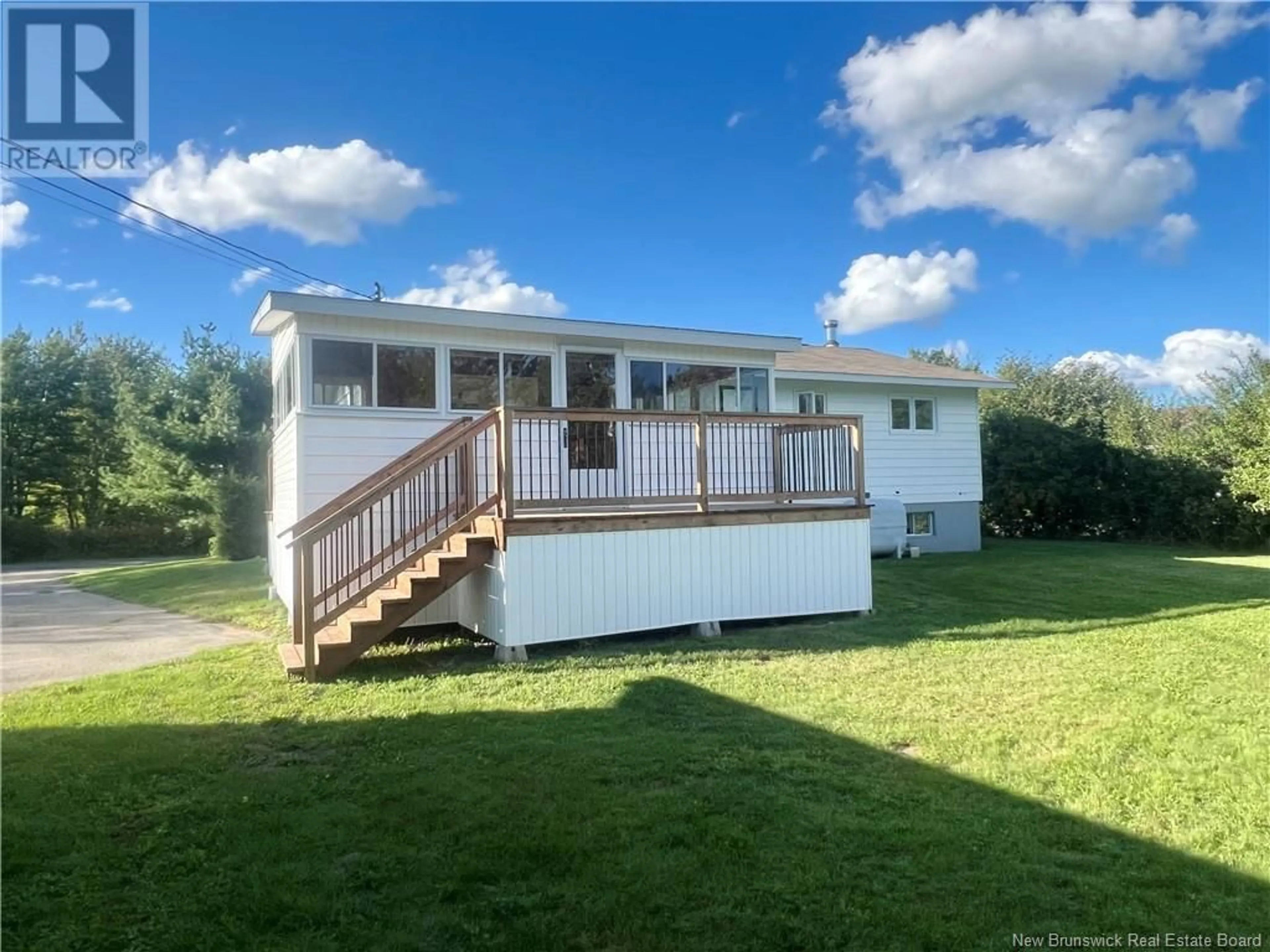 Frontside or backside of a home, the fenced backyard for 24 Catherine Street, Bathurst New Brunswick E8L1W2