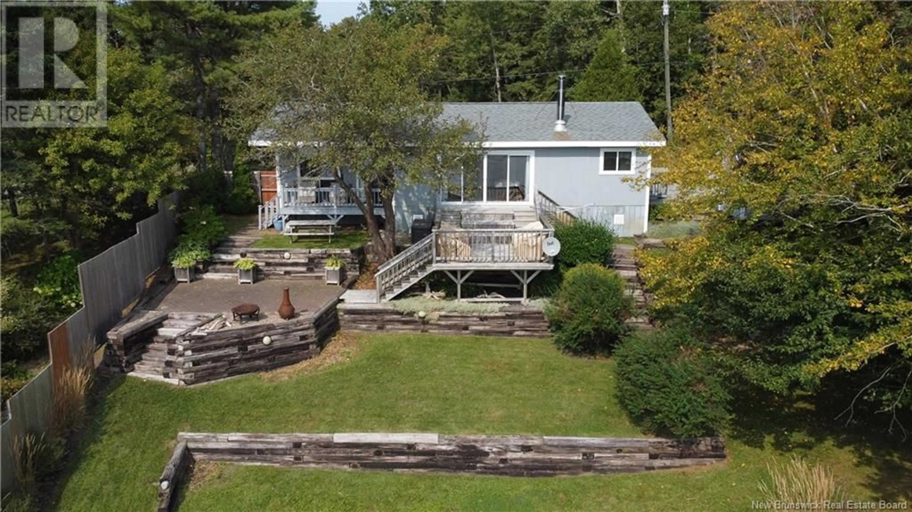 A pic from outside/outdoor area/front of a property/back of a property/a pic from drone, water/lake/river/ocean view for 27 SMYTHE LANE, Oak Bay New Brunswick E3L4H6