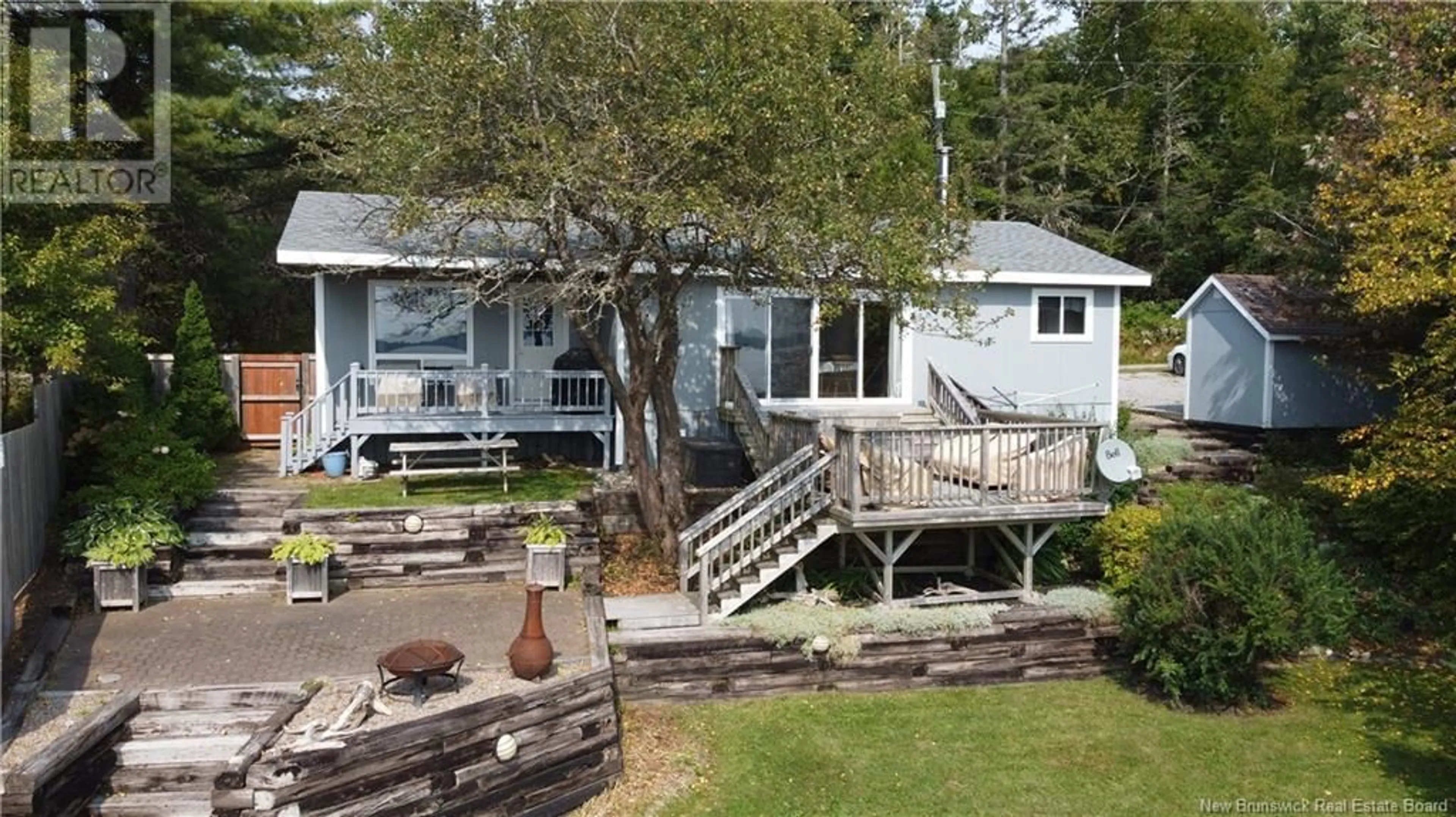 A pic from outside/outdoor area/front of a property/back of a property/a pic from drone, water/lake/river/ocean view for 27 SMYTHE LANE, Oak Bay New Brunswick E3L4H6