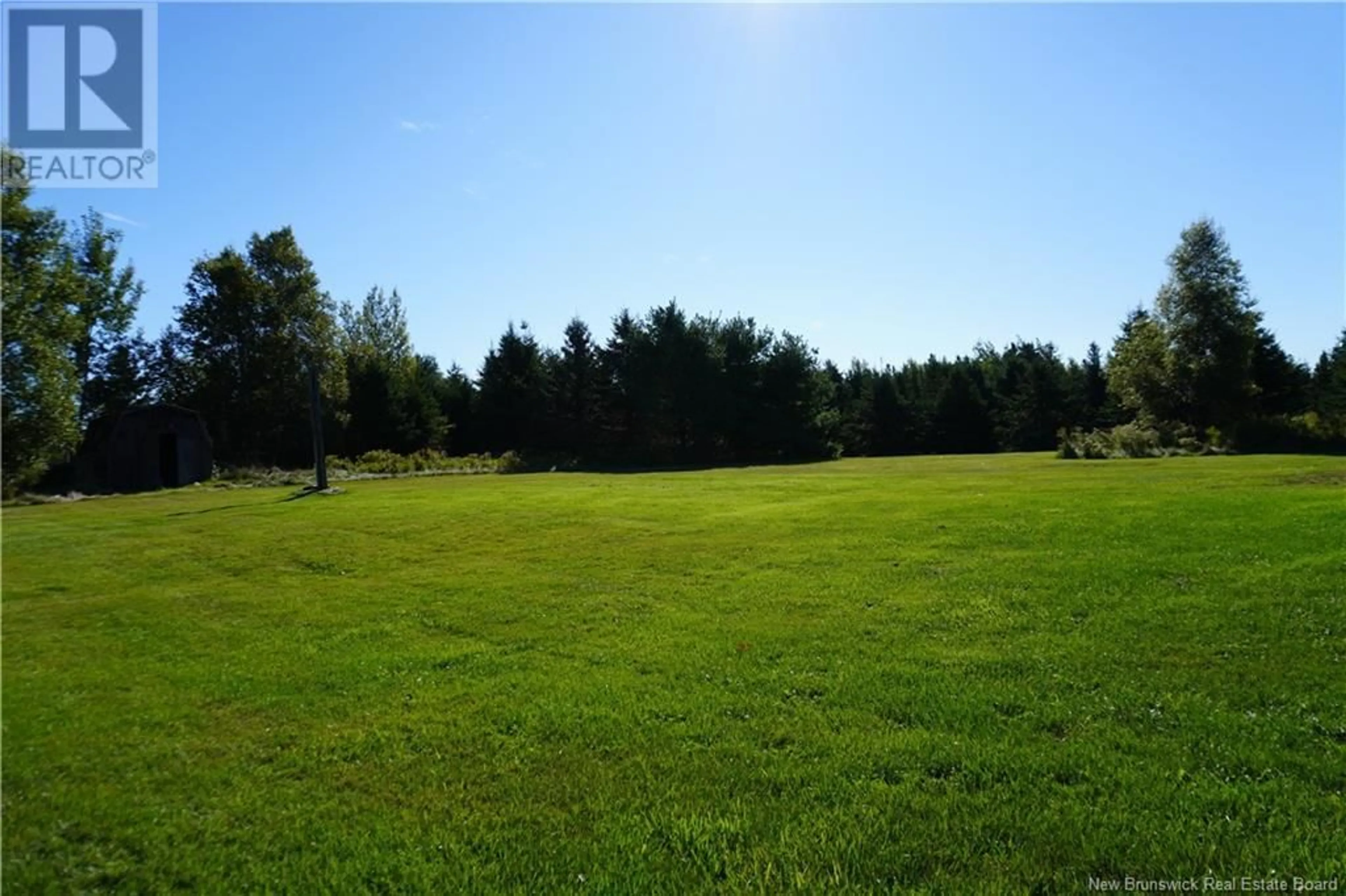 A pic from exterior of the house or condo, the fenced backyard for 8265 134 Route, Galloway New Brunswick E4W5T5