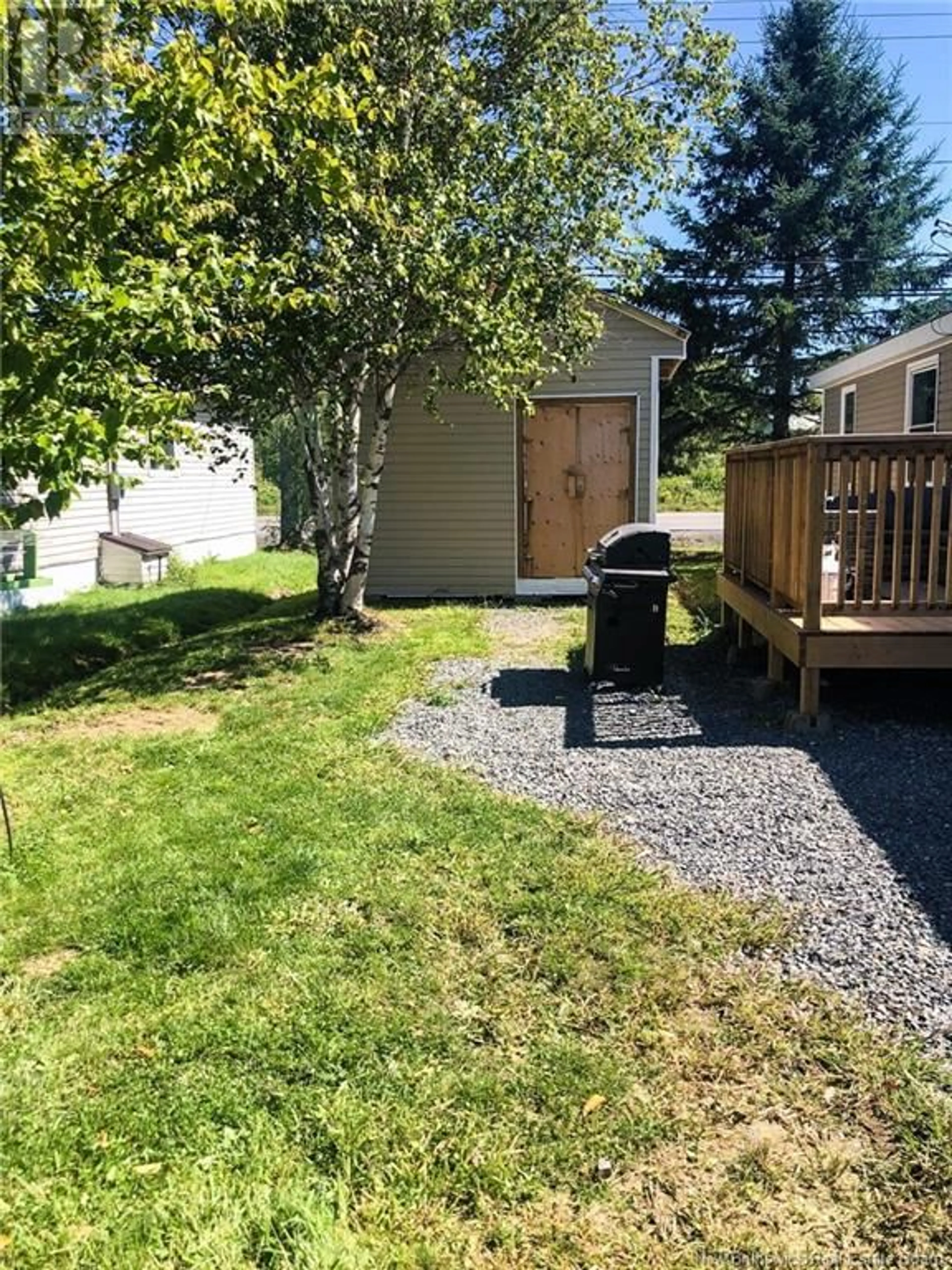 Patio, the fenced backyard for 23 Hedgeview Drive, Fredericton New Brunswick E3B6R6