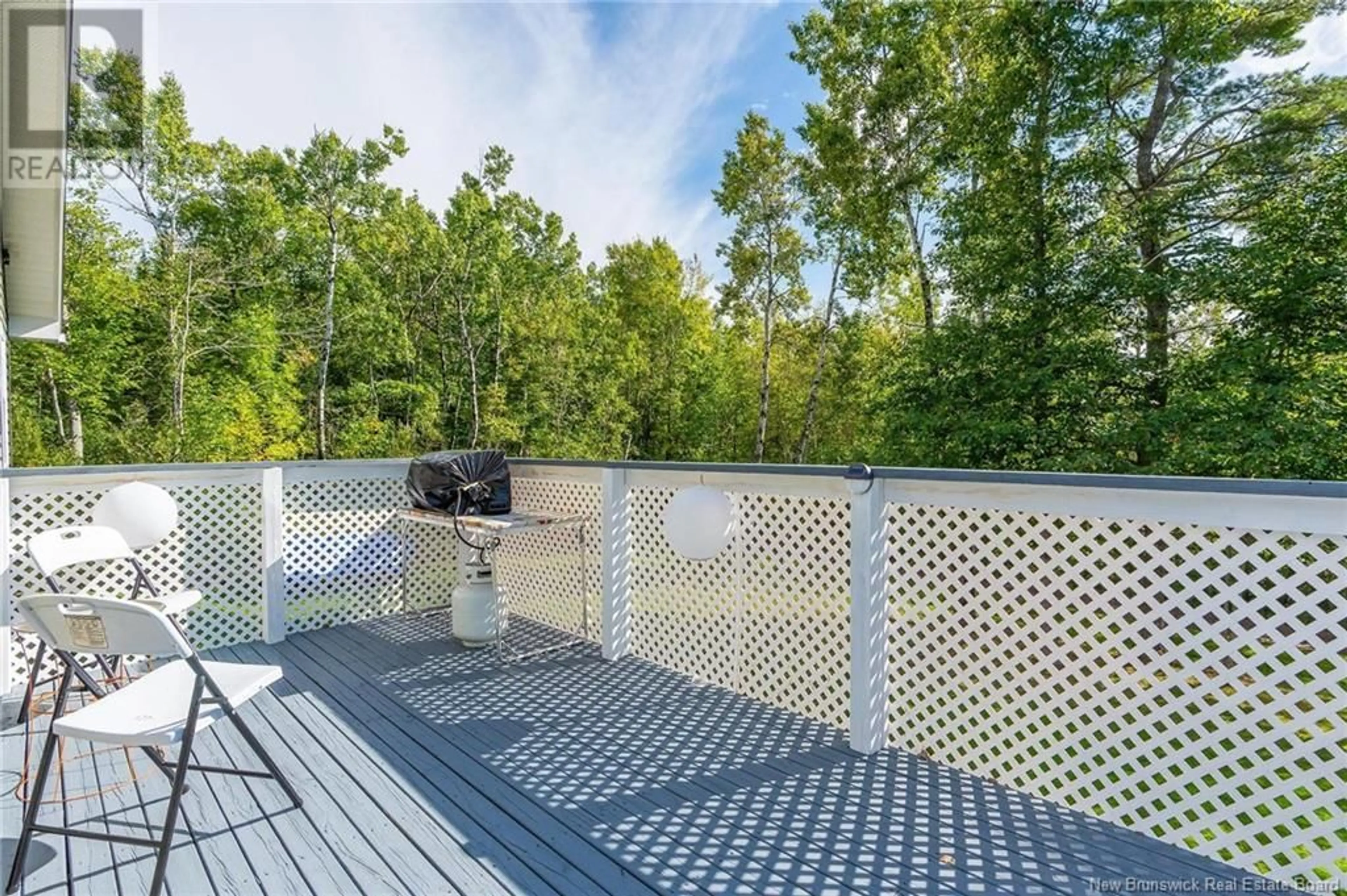 Patio, the fenced backyard for 23 Holland Lane, Cambridge-Narrows New Brunswick E4C4P8