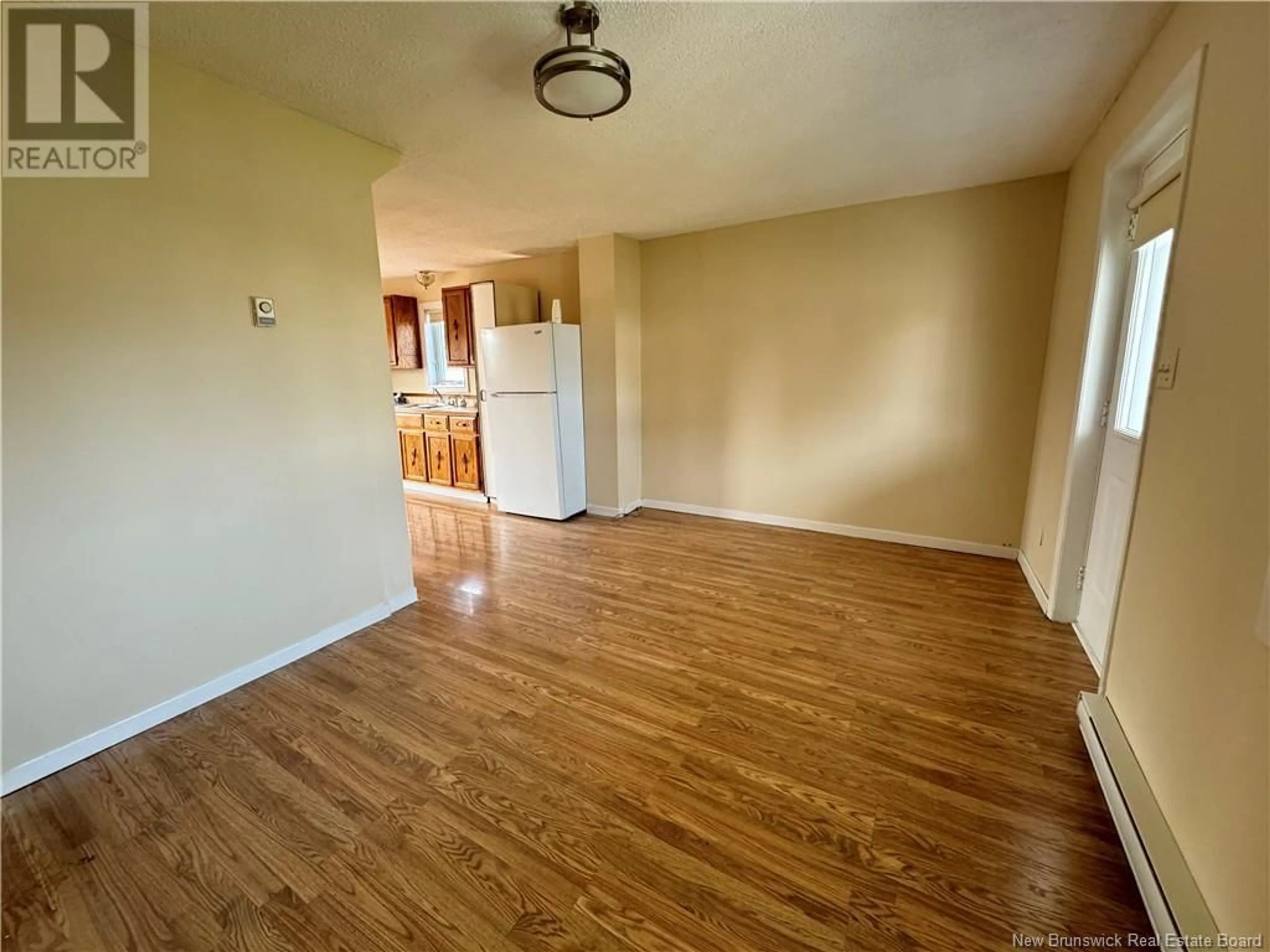 A pic of a room, wood floors for 23 St-Paul Street, Kedgwick New Brunswick E8B1N1