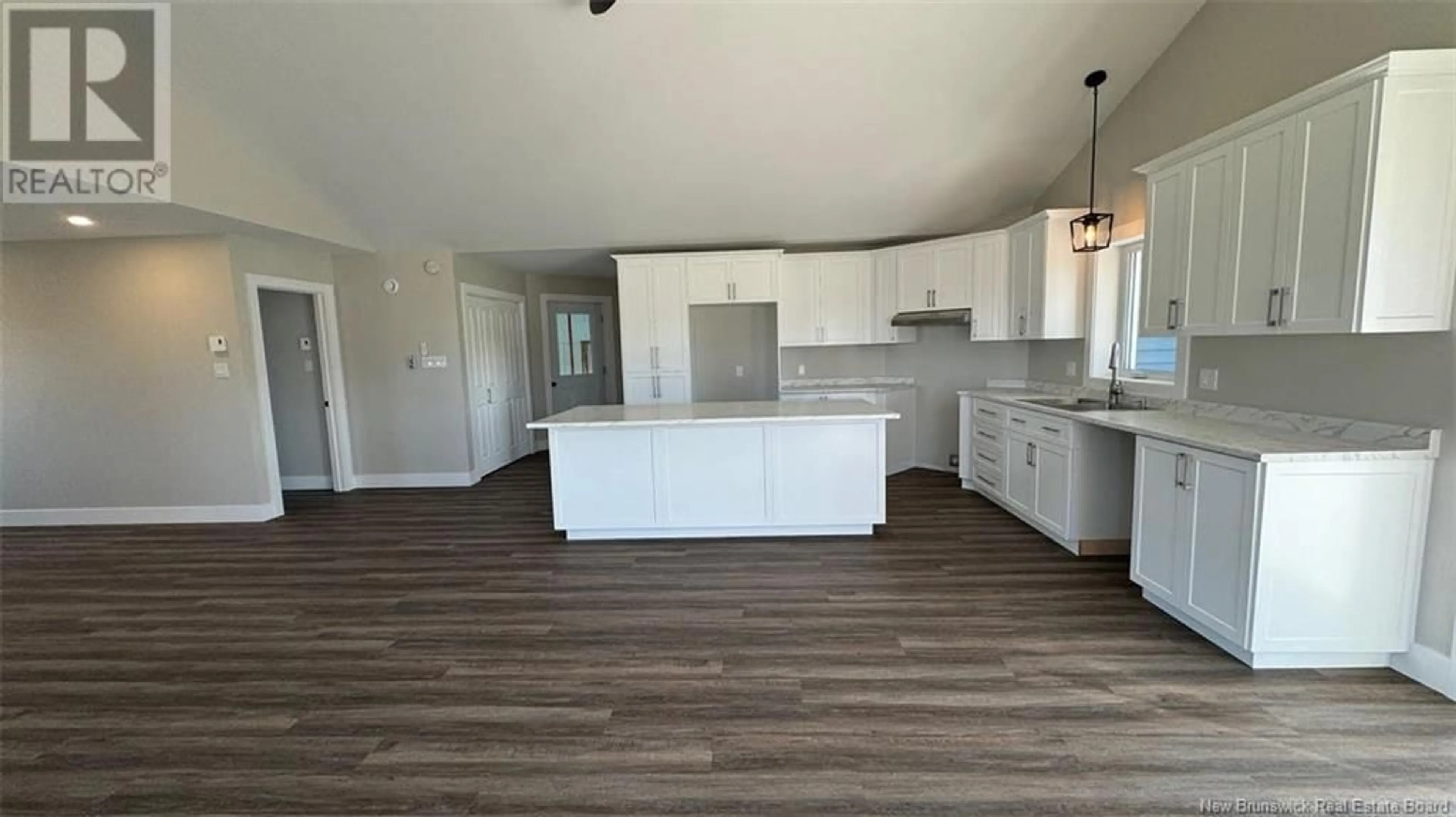 Open concept kitchen for 658 Portage Street, Grand-Sault/Grand Falls New Brunswick E3Z1M7