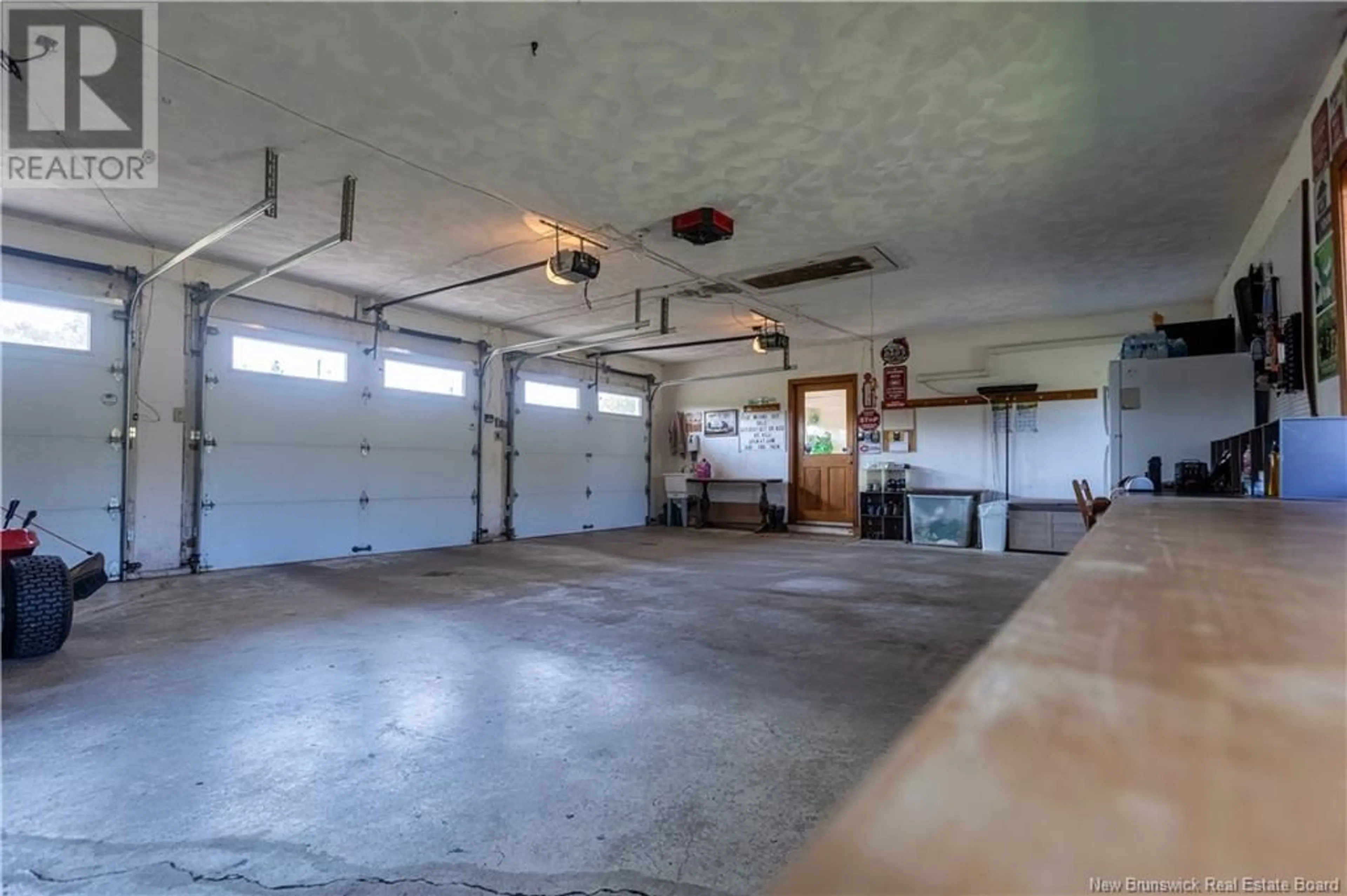 Indoor garage, cement floor for 104 De L'eglise Avenue, Saint-Antoine New Brunswick E4V1M6