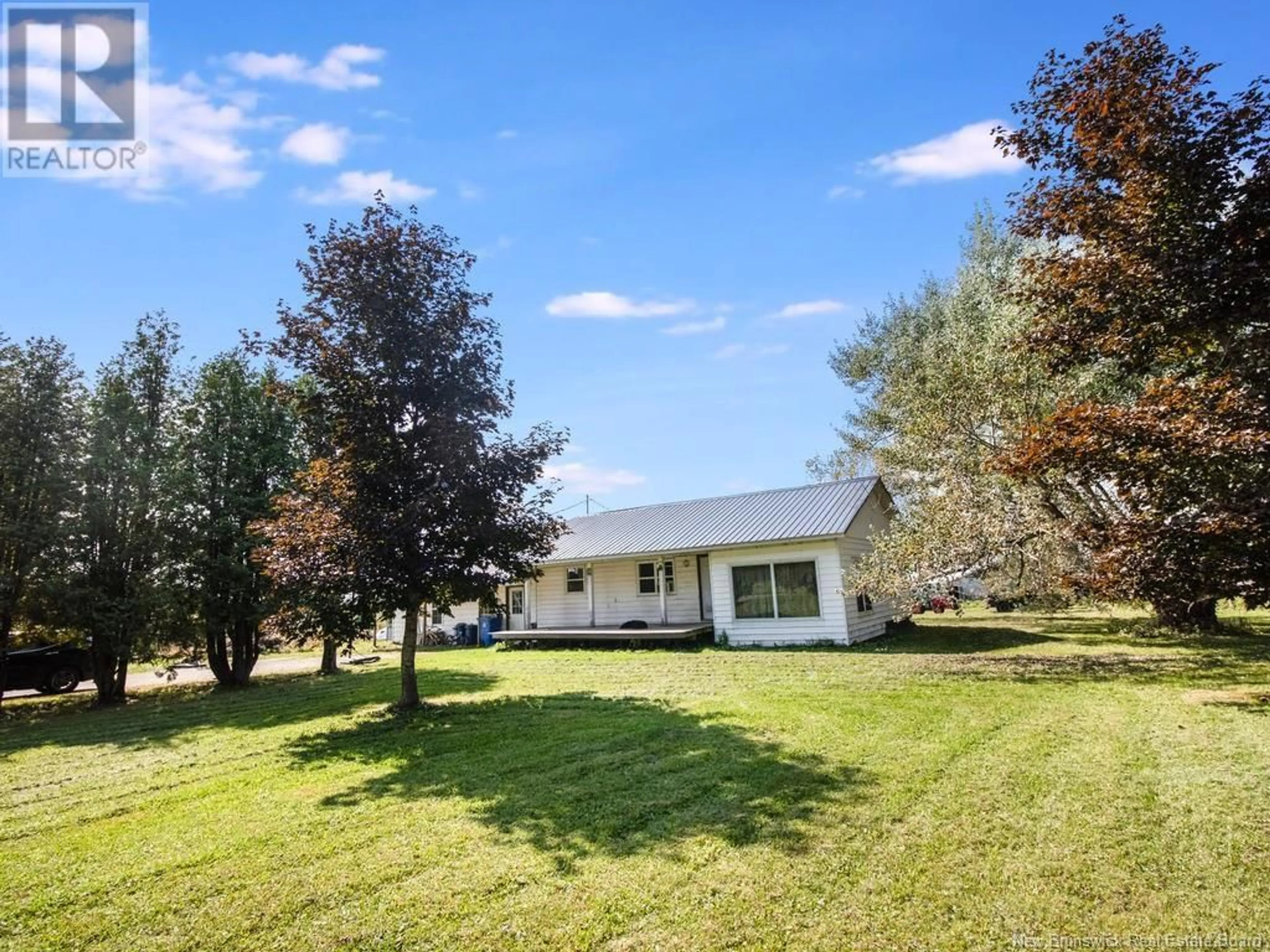 A pic from exterior of the house or condo, the fenced backyard for 3539 550 Route, Long Settlement New Brunswick E7K1R9