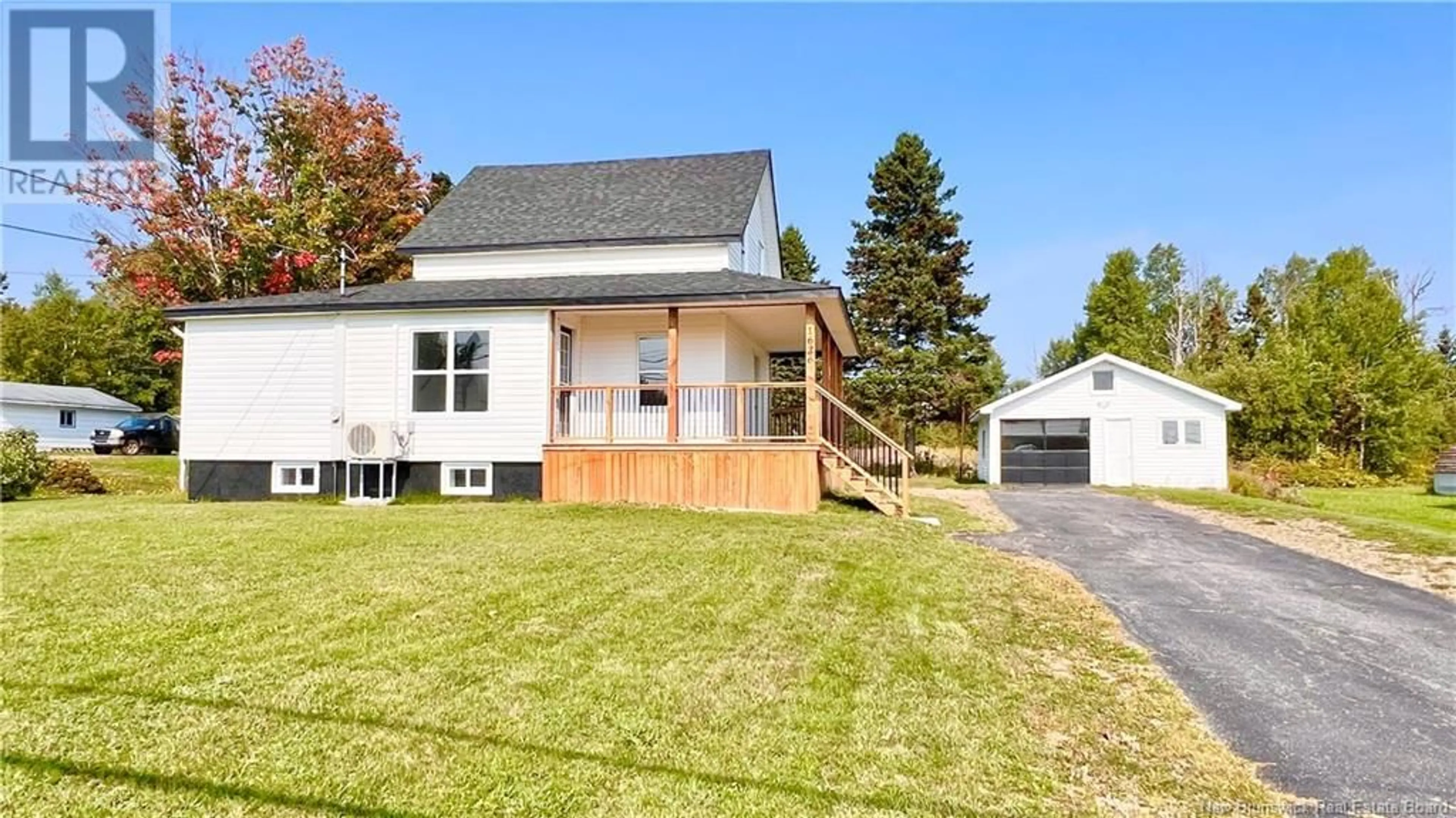 Frontside or backside of a home, the fenced backyard for 1626 Robertville, Robertville New Brunswick E8K2T1