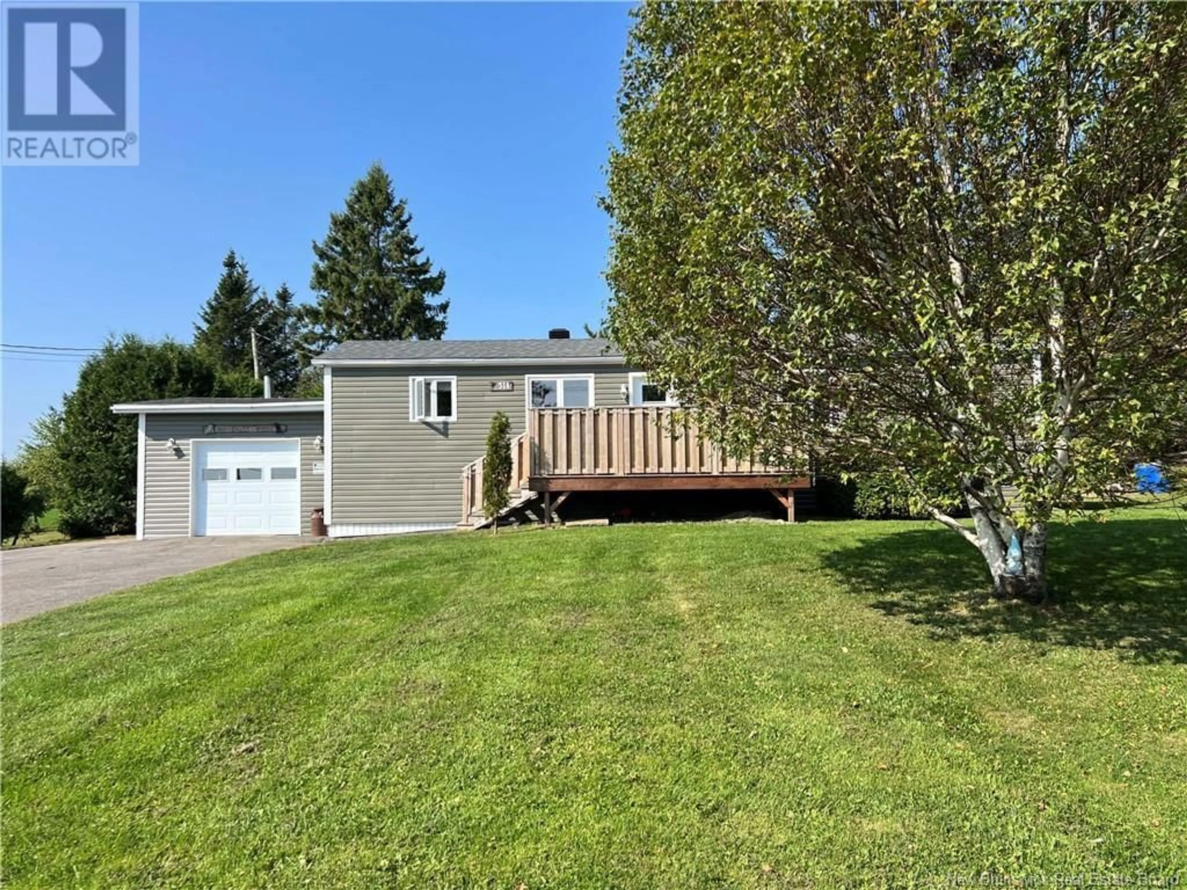 Frontside or backside of a home, the fenced backyard for 314 Route 255, Saint-André New Brunswick E3Y2V7