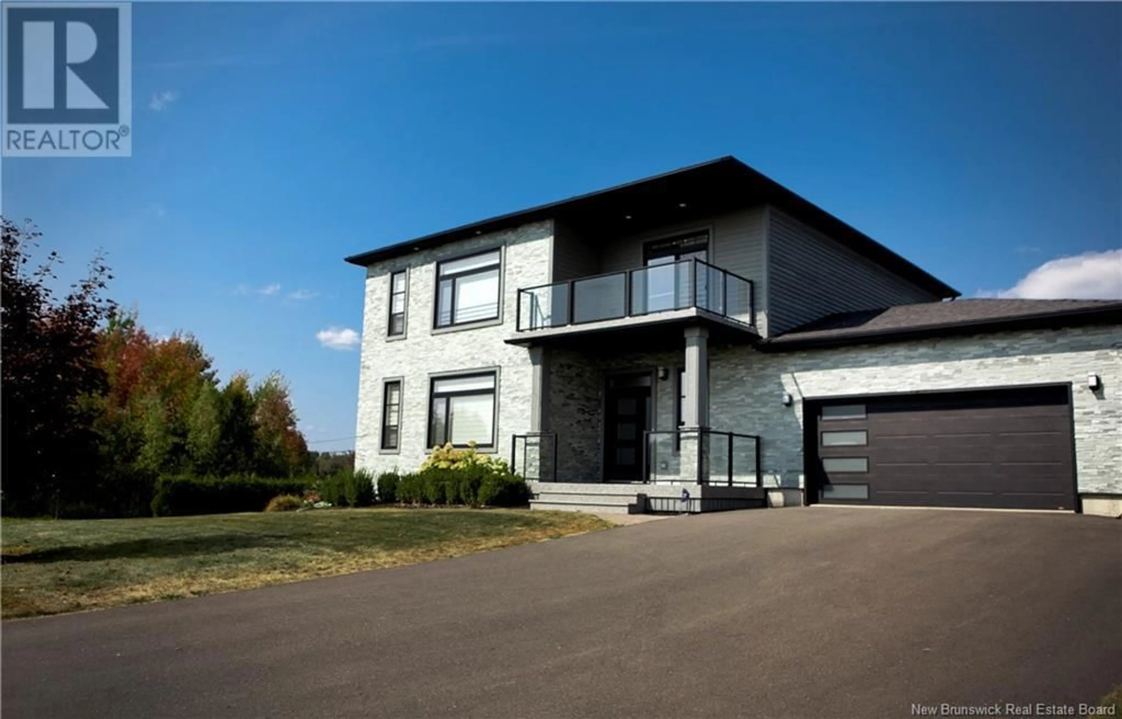 Frontside or backside of a home, the front or back of building for 44 Bicentennial Drive, Woodstock New Brunswick E7M6A7