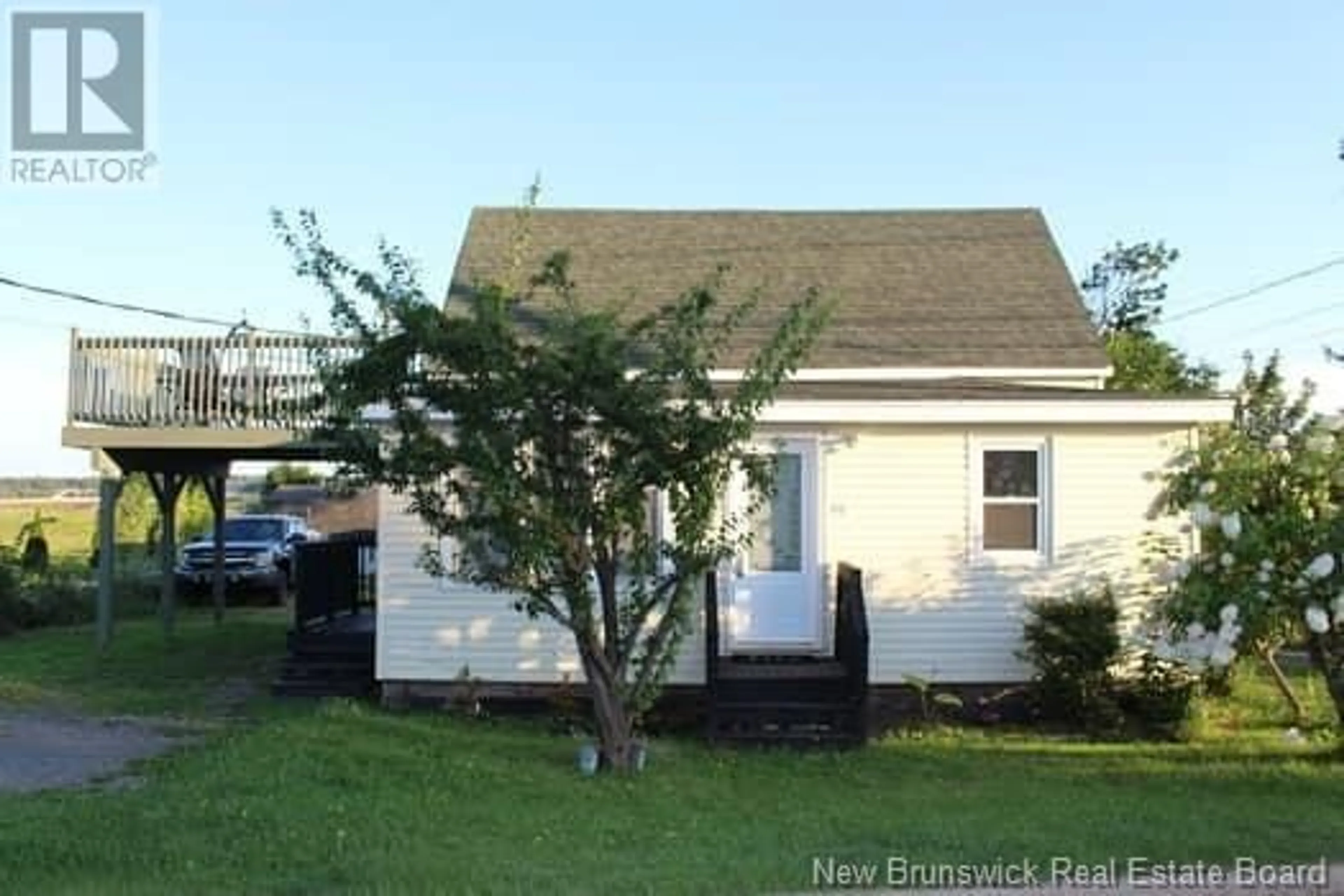 Frontside or backside of a home, the fenced backyard for 26 Salisbury Road, Moncton New Brunswick E1A1A4