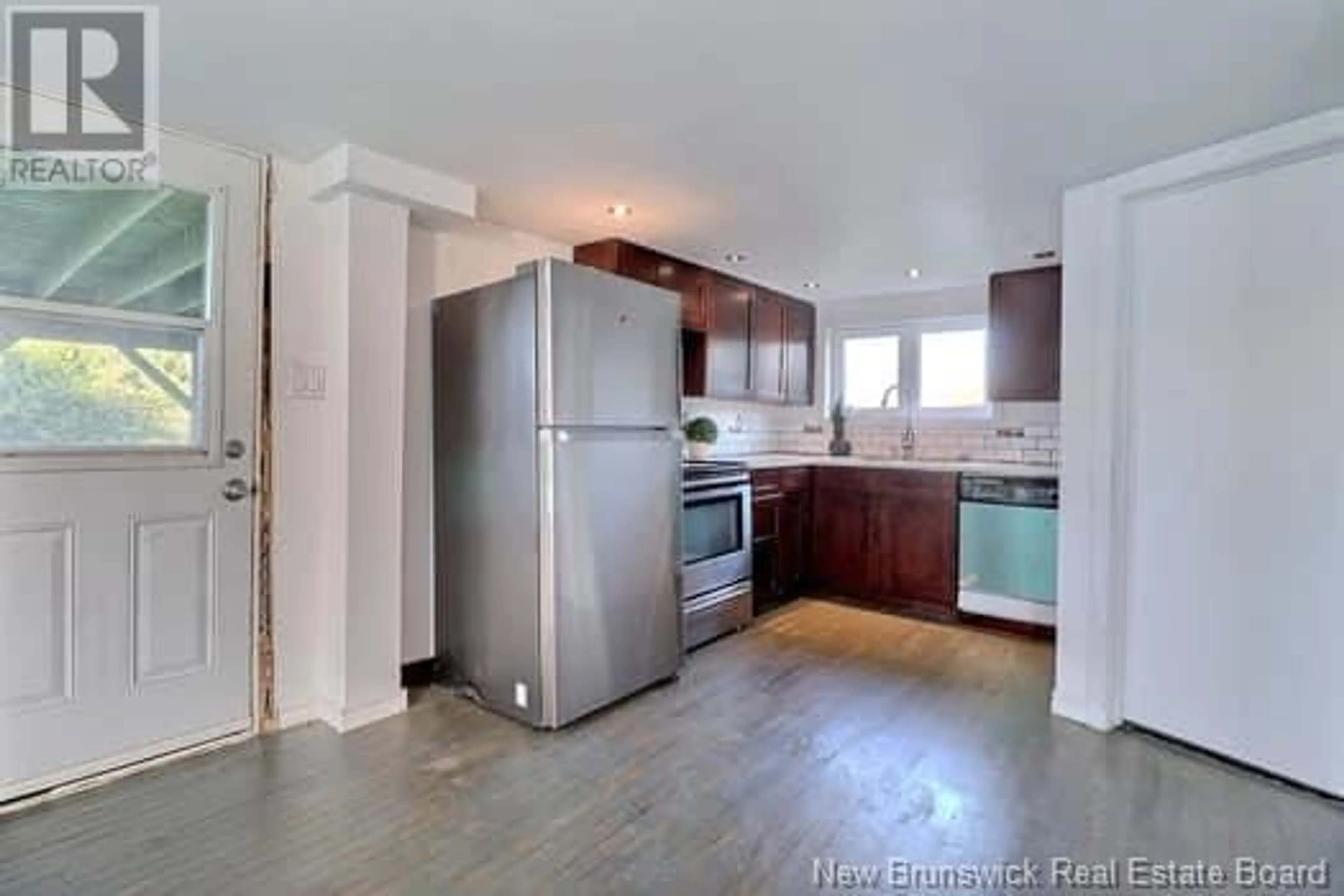 Open concept kitchen for 26 Salisbury Road, Moncton New Brunswick E1A1A4