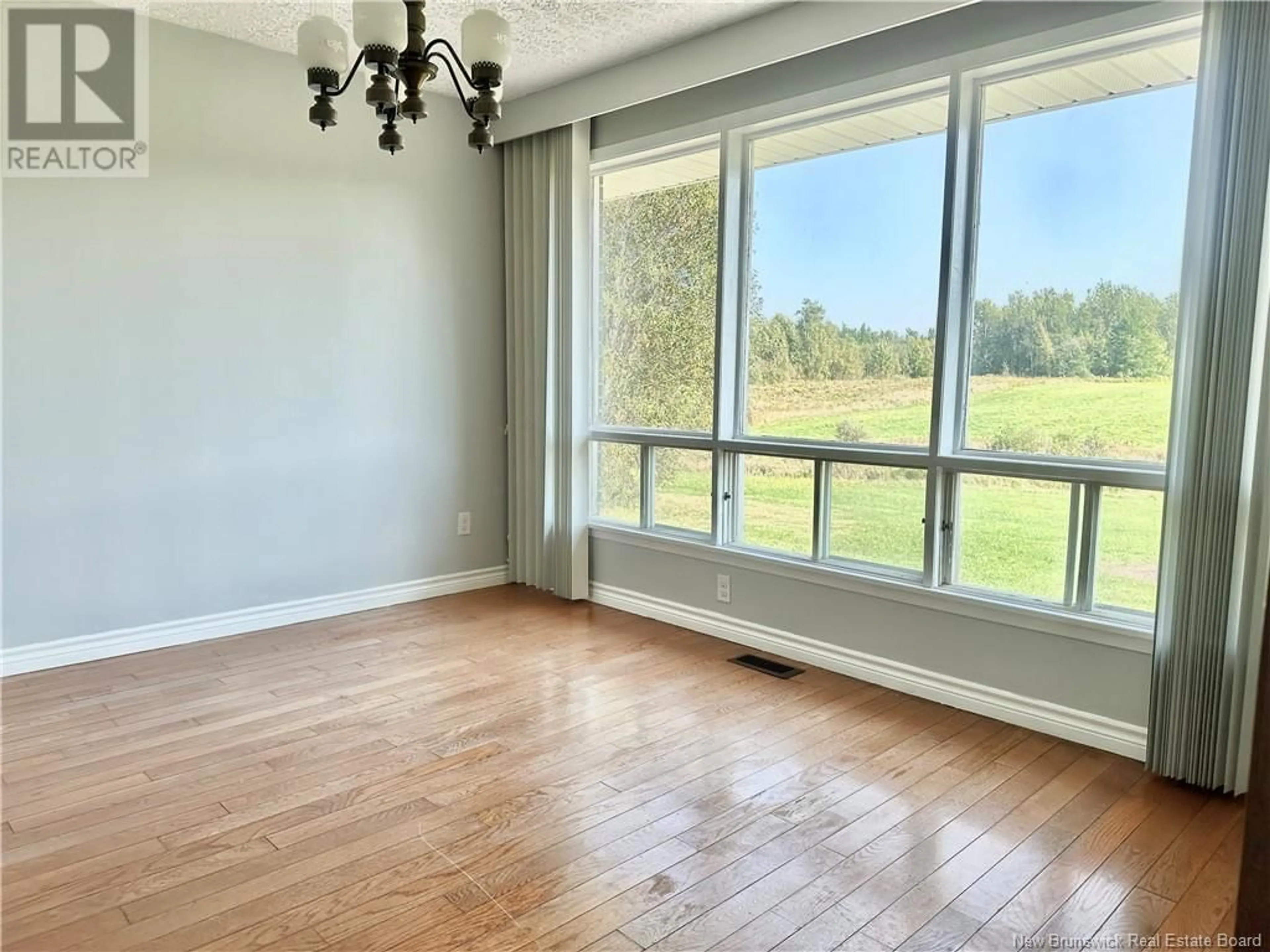 A pic of a room, wood floors for 8021 Route 117, Black River Bridge New Brunswick E1N5K7