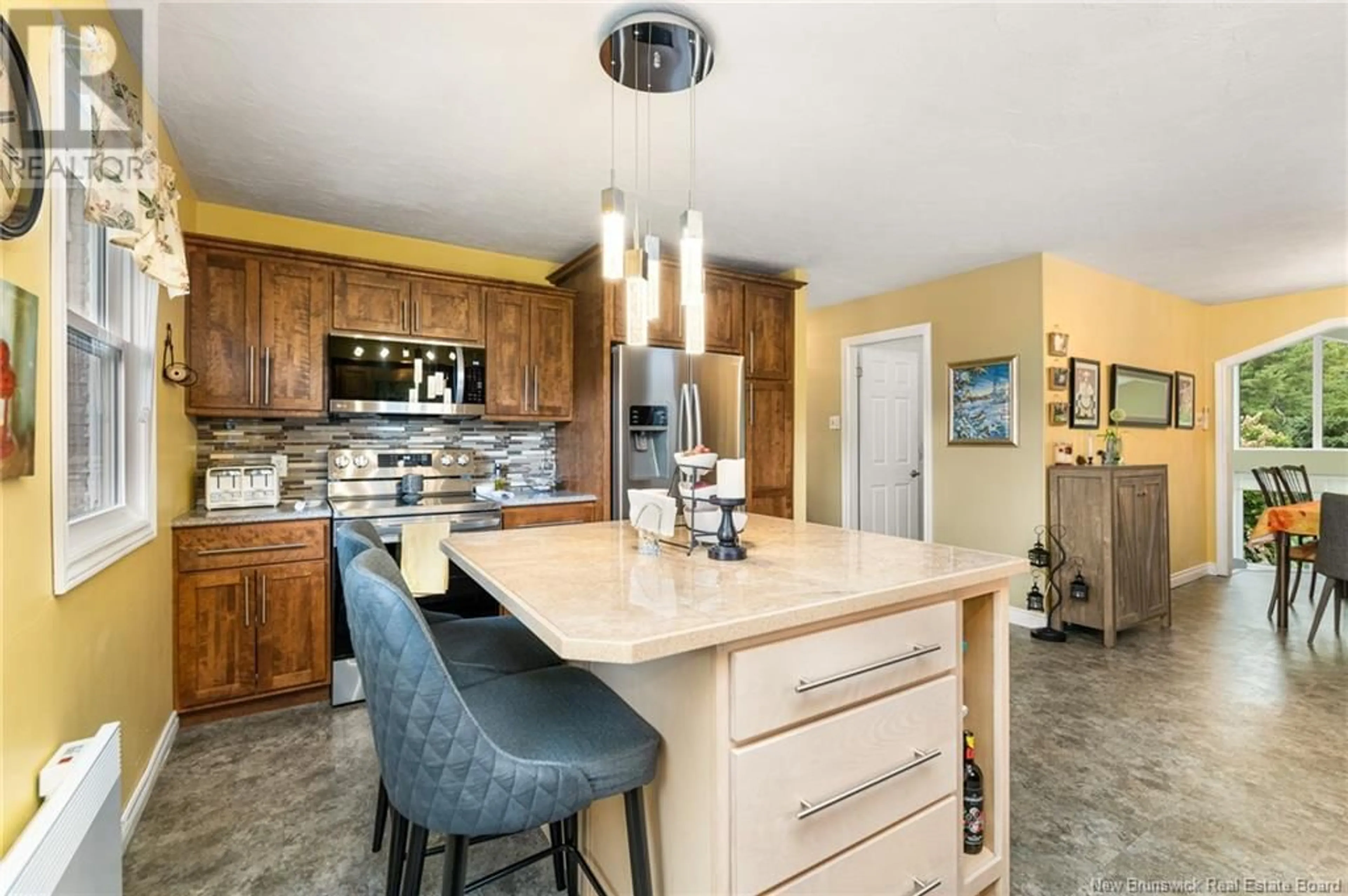 Open concept kitchen for 41 933 Route, Grand-Barachois New Brunswick E4P8K6