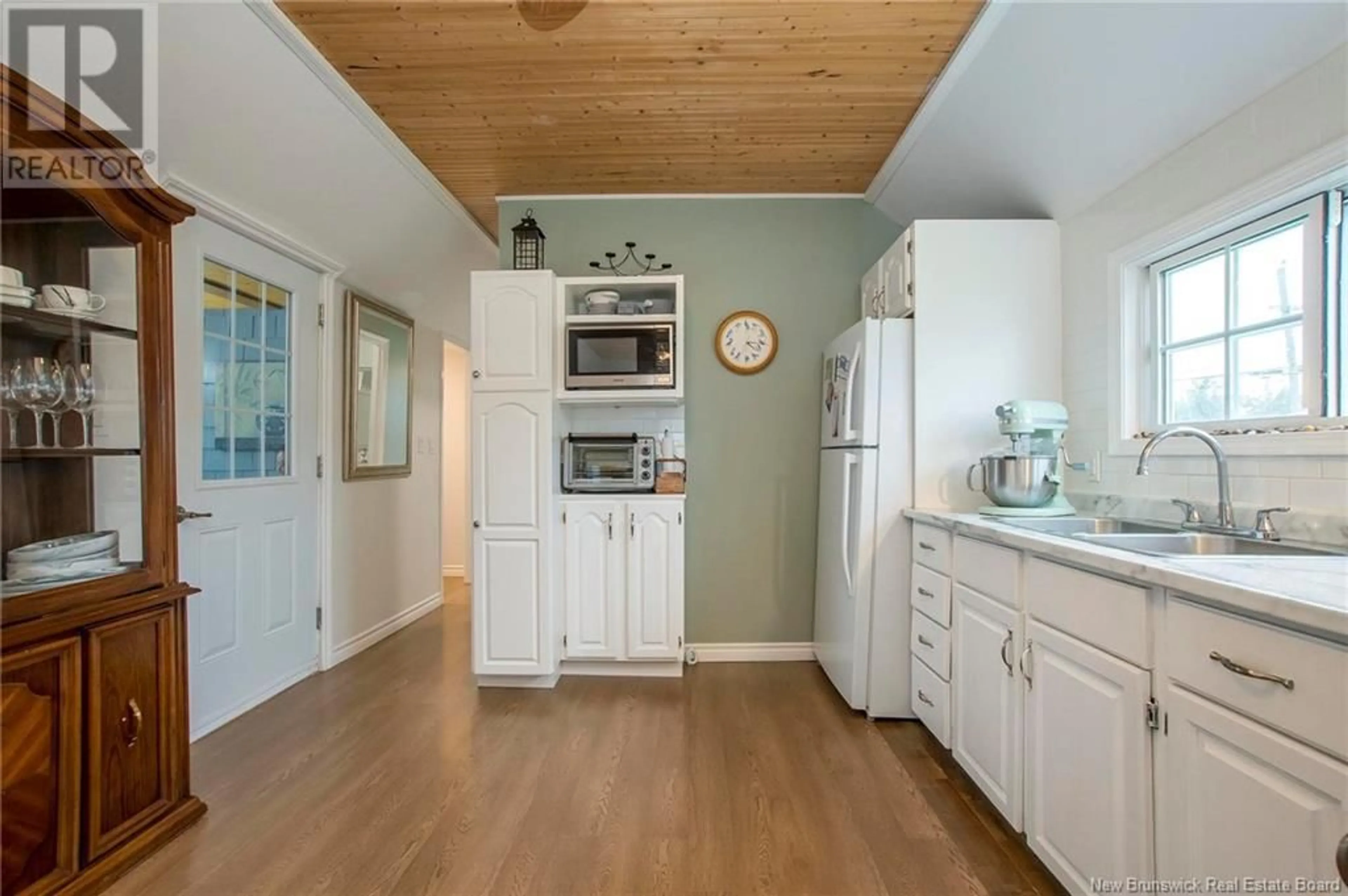 Kitchen, wood floors, cottage for 13 Third Street, Lakeville New Brunswick E1H1K6