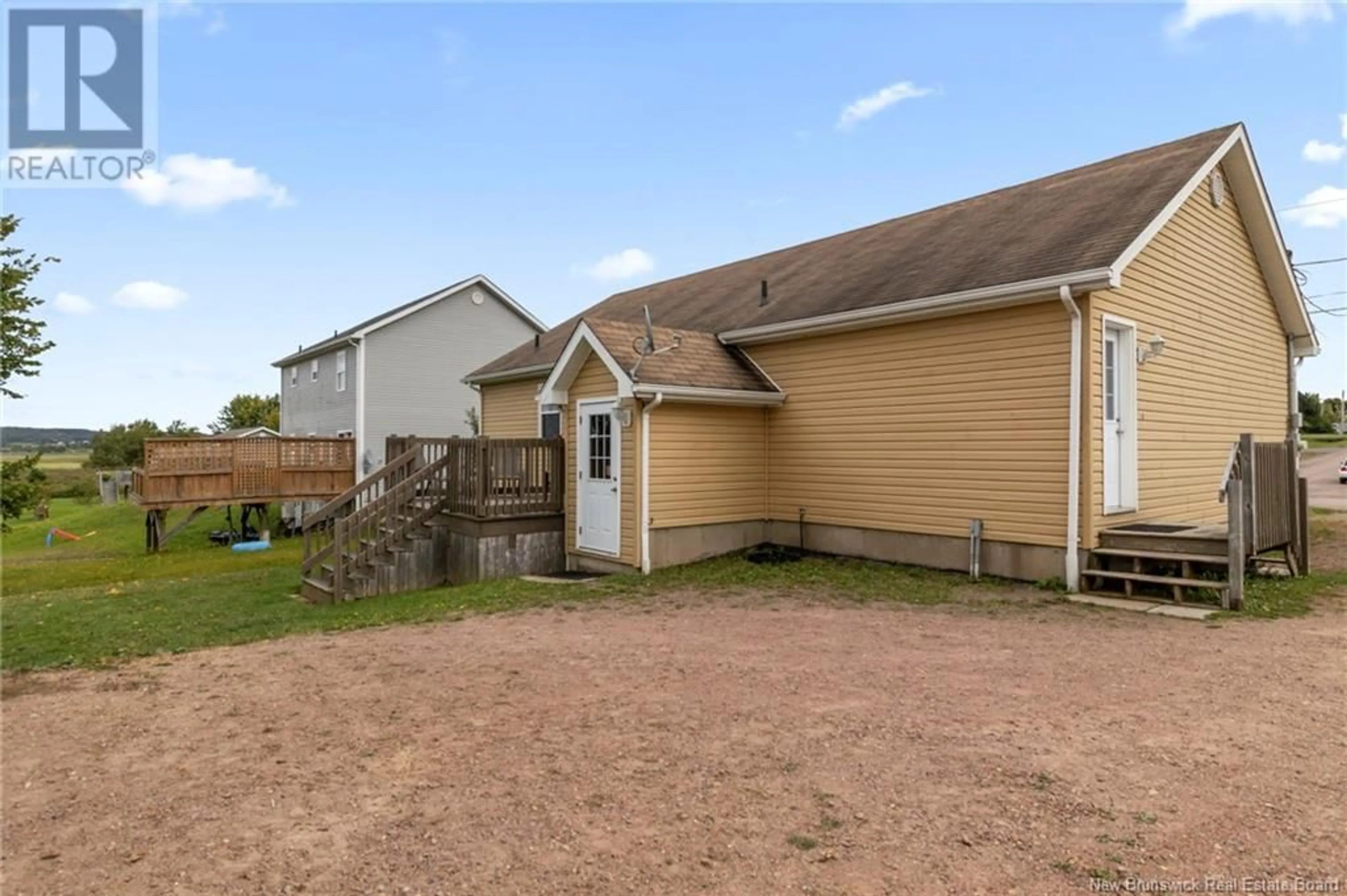 Frontside or backside of a home, the fenced backyard for 164 Leandre, Memramcook New Brunswick E4K2J5