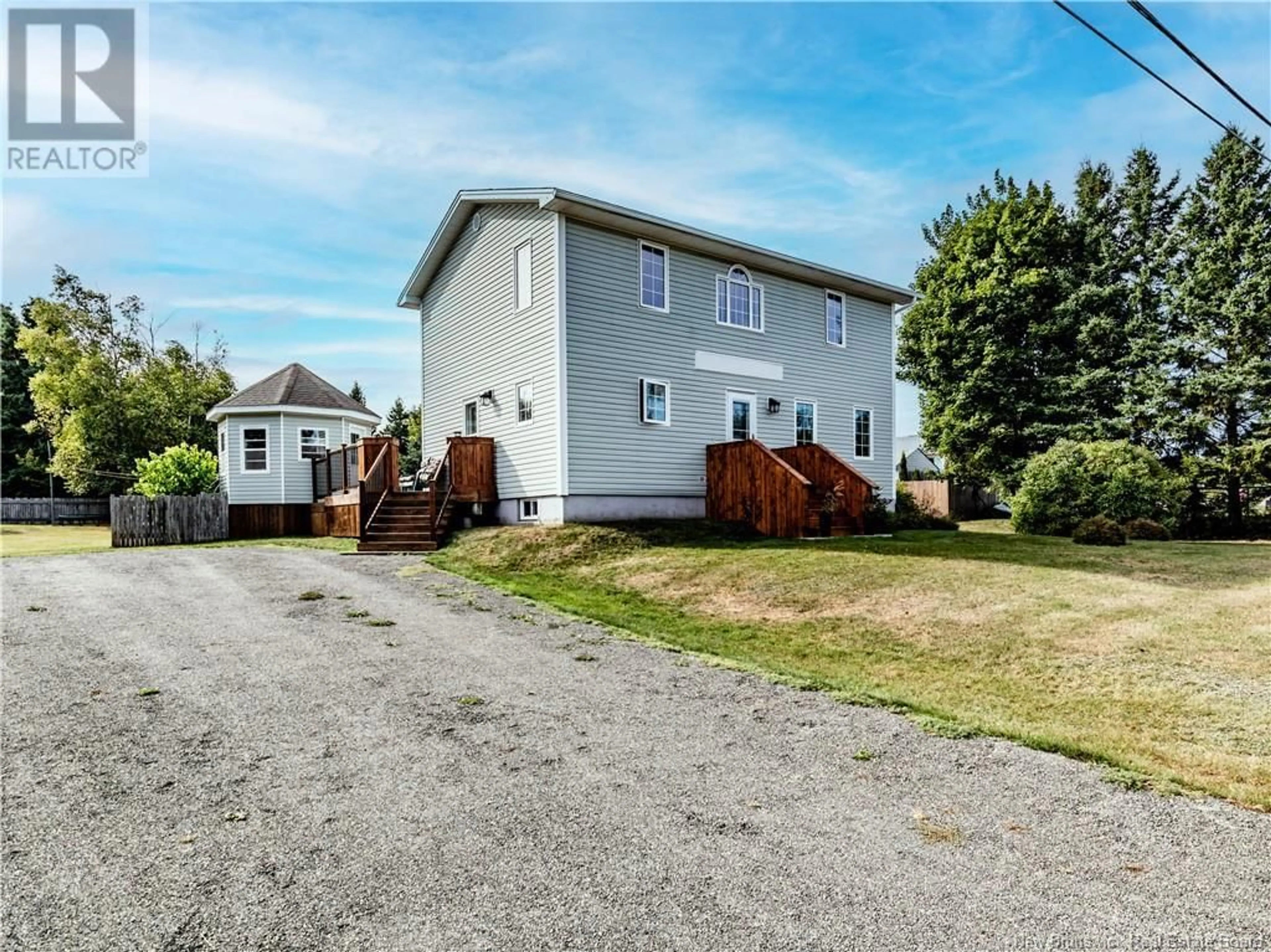 Frontside or backside of a home, the fenced backyard for 5 Alswood, Shediac River New Brunswick E4R6A7