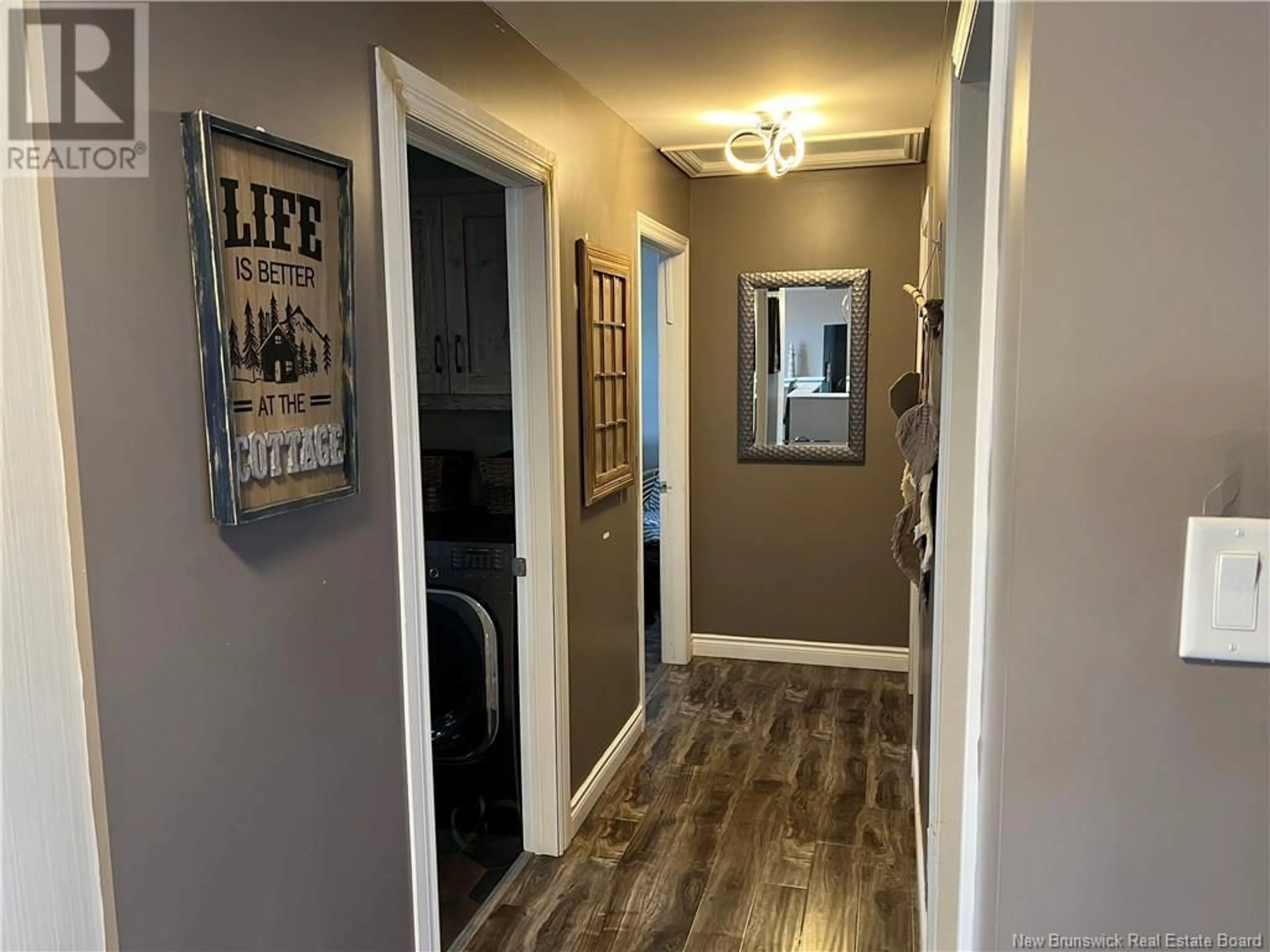 Indoor entryway, wood floors for 6867 Route 11, Tracadie Beach New Brunswick E1X1K4