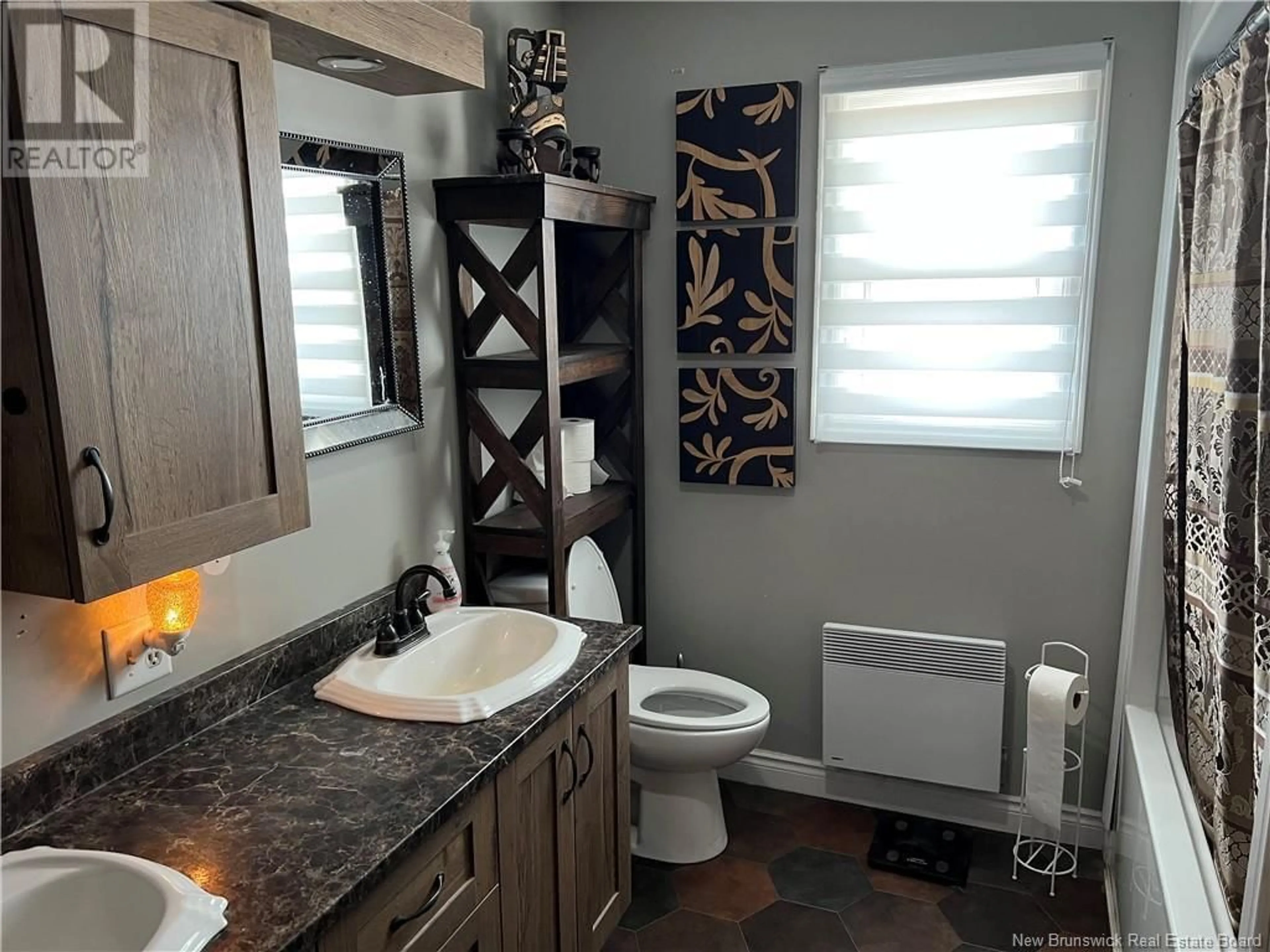 Standard bathroom, wood floors for 6867 Route 11, Tracadie Beach New Brunswick E1X1K4