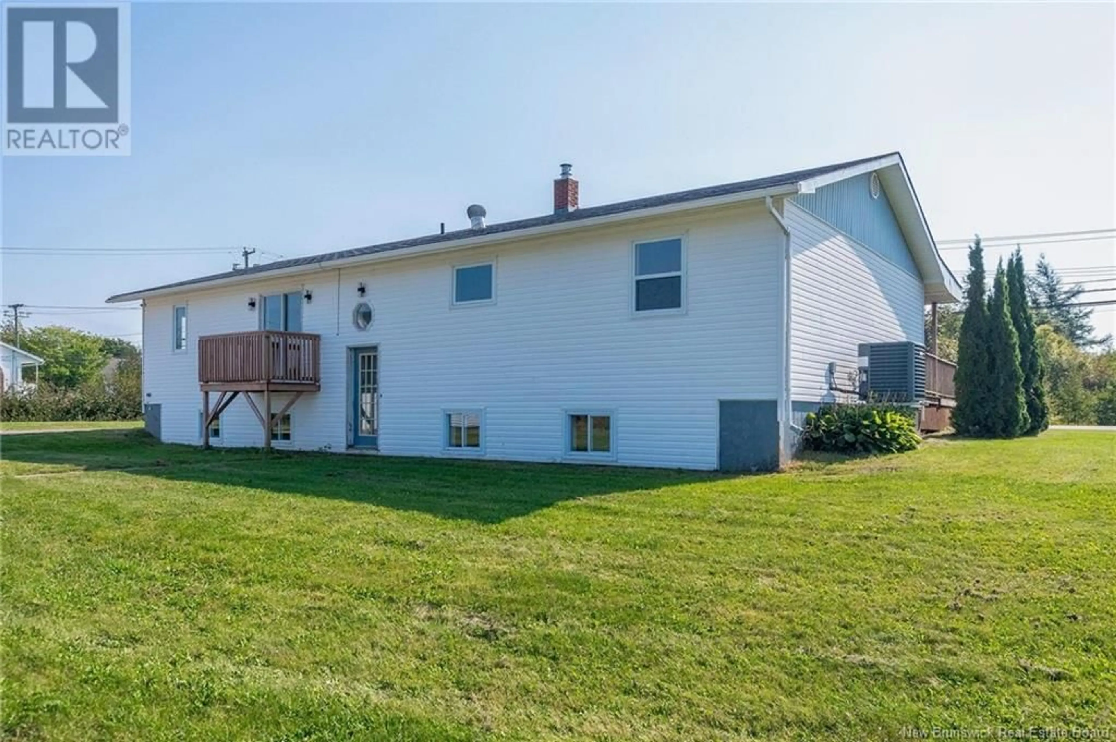 Frontside or backside of a home, the fenced backyard for 63 King St, Sackville New Brunswick E4L3G4