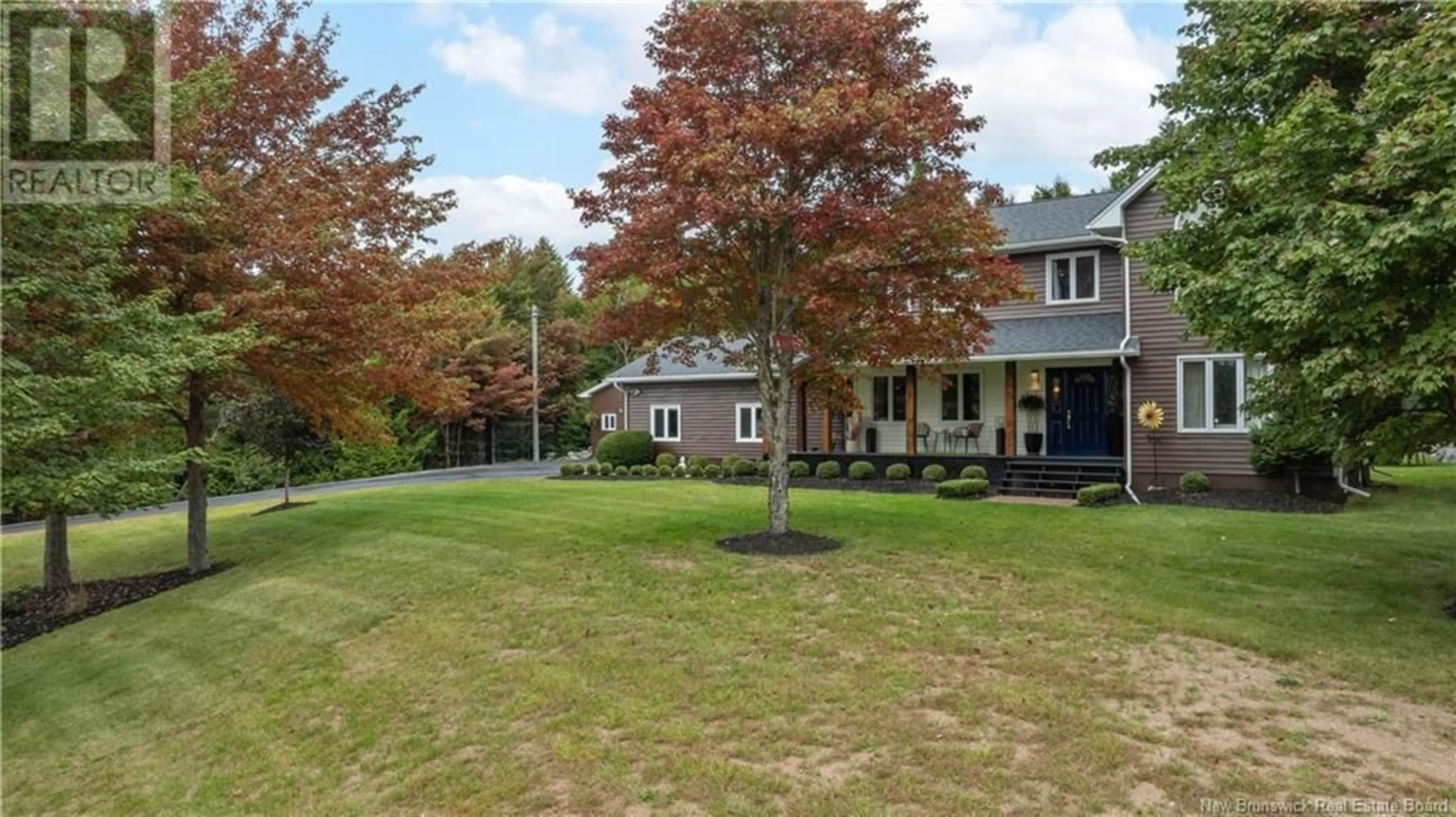 A pic from exterior of the house or condo, the fenced backyard for 90 Southridge Road, Rothesay New Brunswick E2S1C5