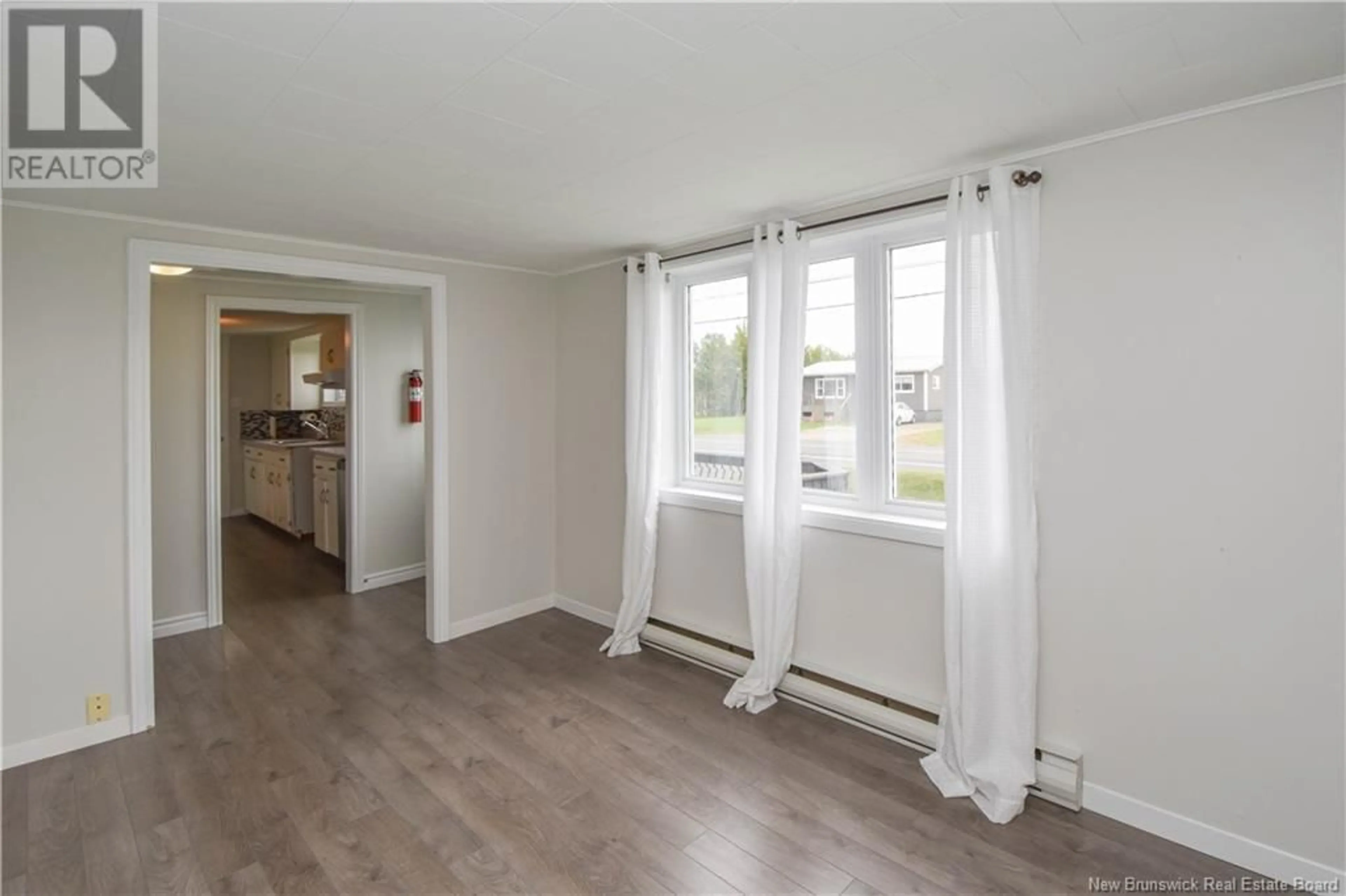 A pic of a room, wood floors for 5883 340 Route, Haut-Paquetville New Brunswick E8R1S9