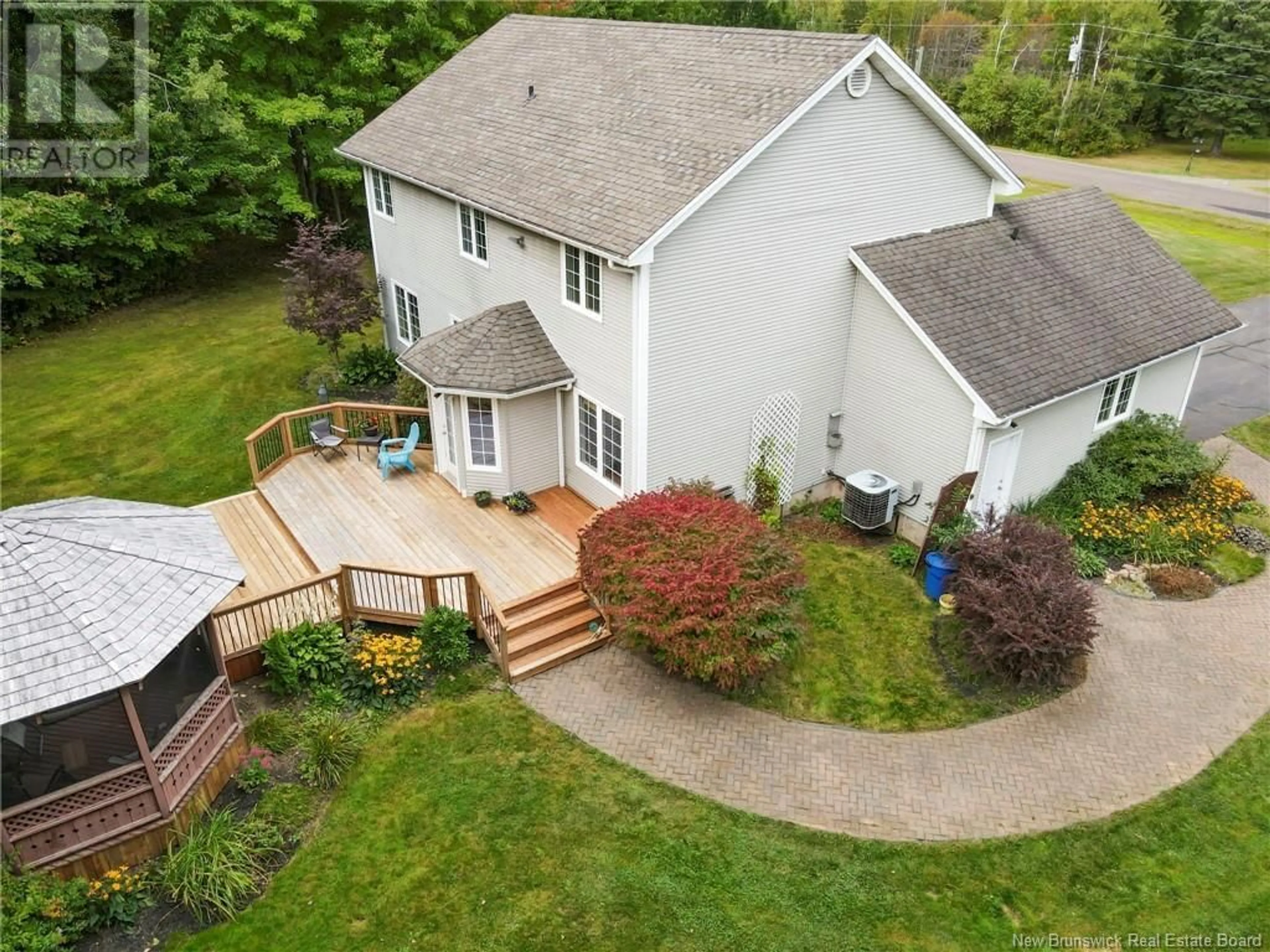 Frontside or backside of a home, the fenced backyard for 36 Riverbend Drive, Upper Coverdale New Brunswick E1J2B3