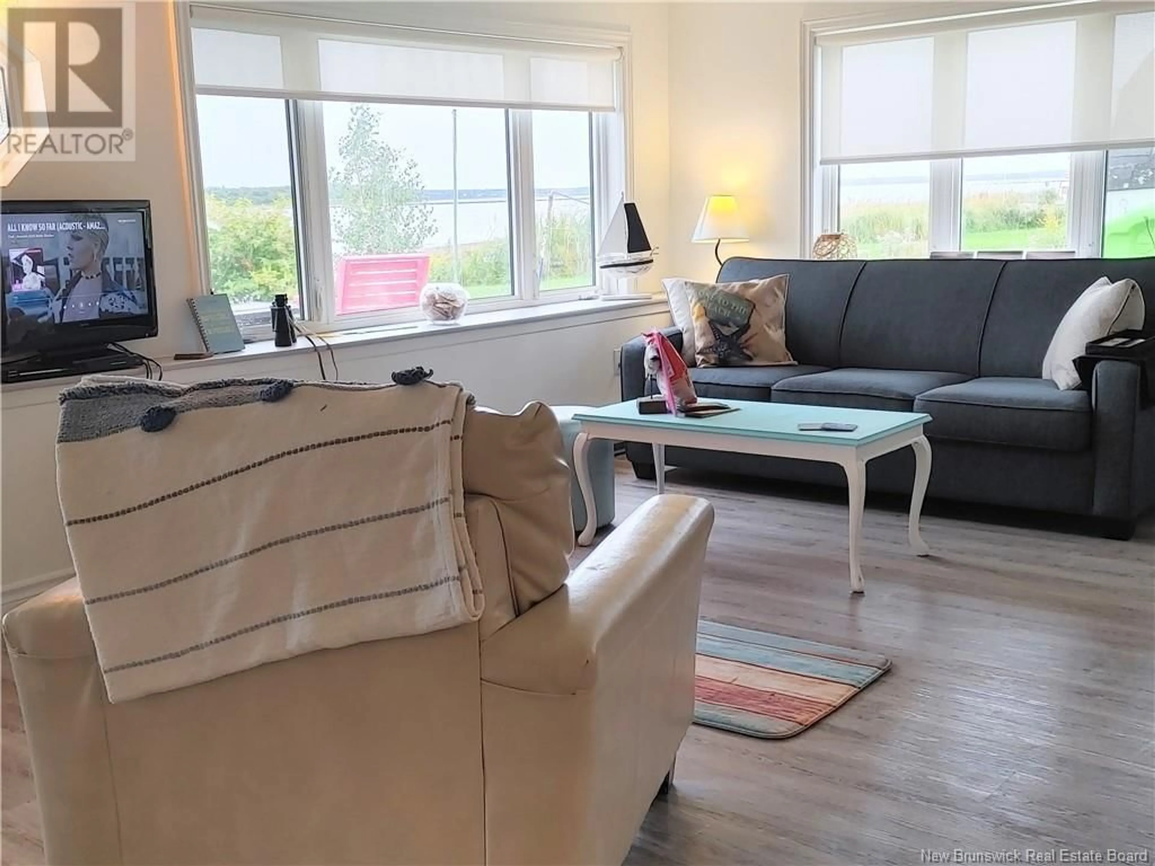 Living room, wood floors for 2 De La Mer Boulevard, Cocagne New Brunswick E4R2L9